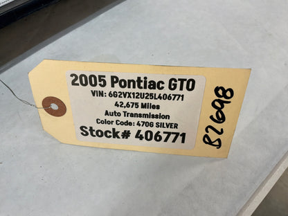 2005 Pontiac GTO Black Suede Lower Dash Knee Bolster Fuse Cover OEM