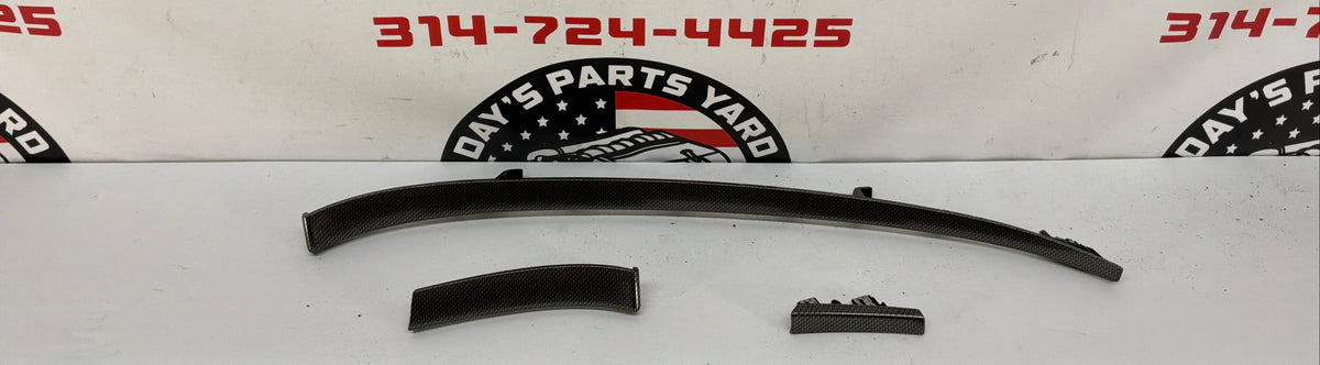 REPICTURE W/ TRIM OFF CENTER CONSOLE2009 Cadillac CTS-V Sedan Carbon Fiber Dash Trim Panel Molding Inserts OEM - Day's Parts Yard