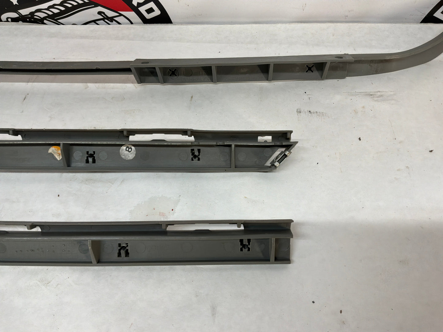 2005 Pontiac GTO RH & LH Rear Bumper Brackets Guides Supports OEM