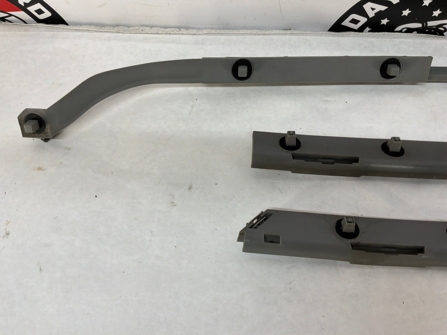 2005 Pontiac GTO RH & LH Rear Bumper Brackets Guides Supports OEM