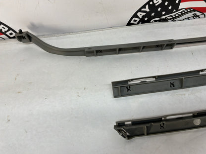 2005 Pontiac GTO RH & LH Rear Bumper Brackets Guides Supports OEM
