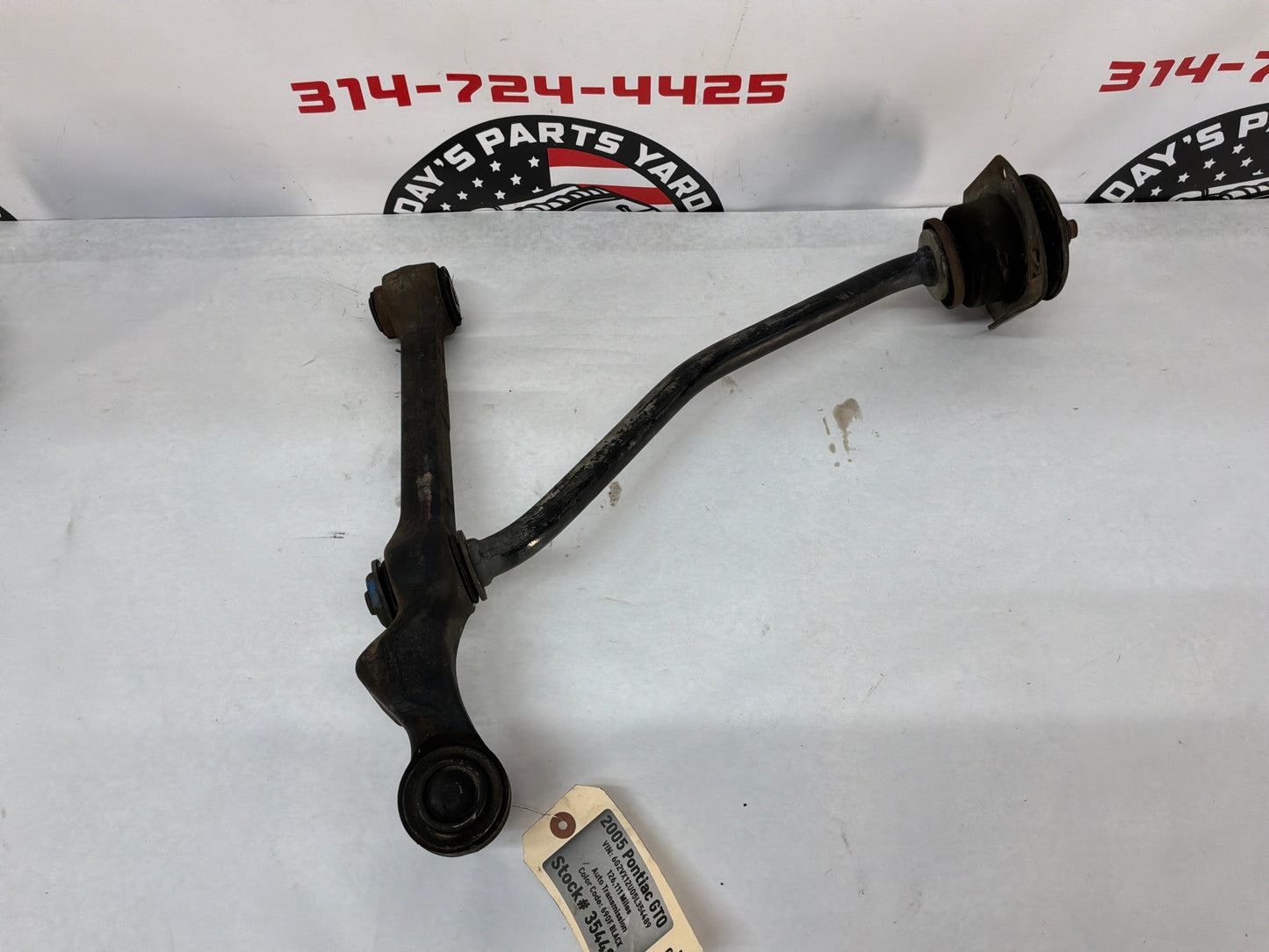 2005 Pontiac GTO LH Driver Front Suspension Lower Control Arm Radius Rod OEM