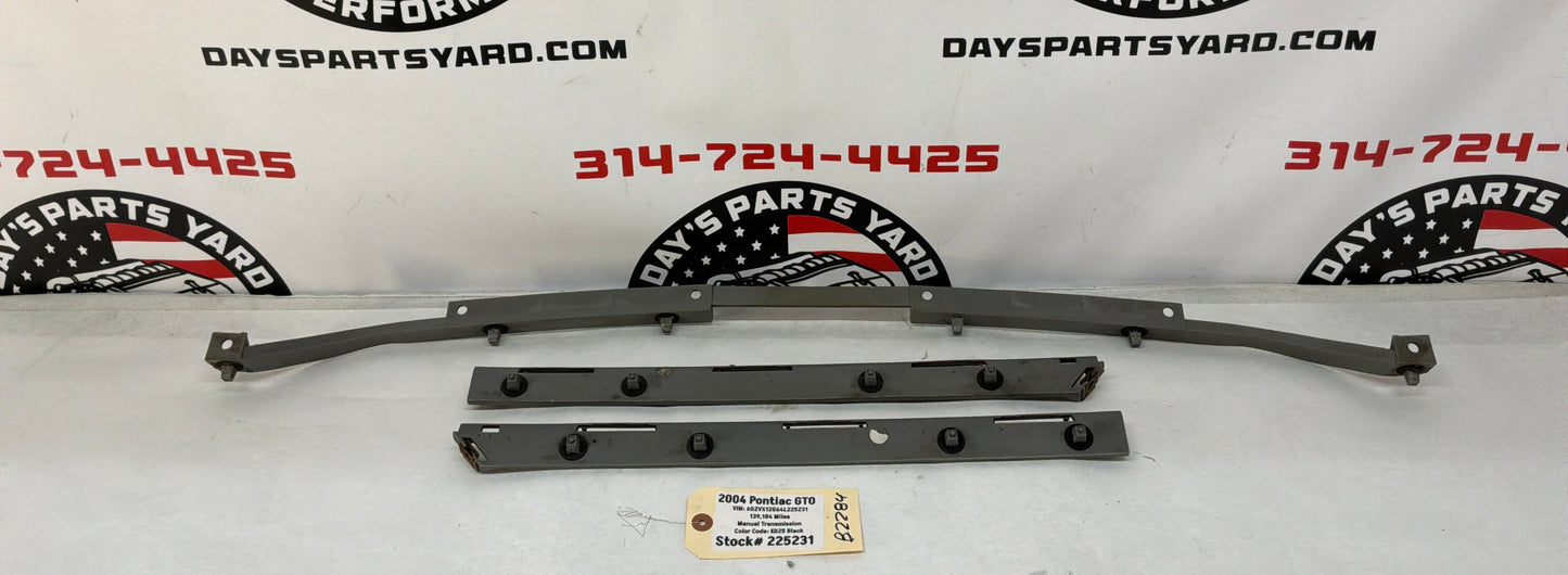 2004 Pontiac GTO Rear Bumper Brackets Guides Set OEM