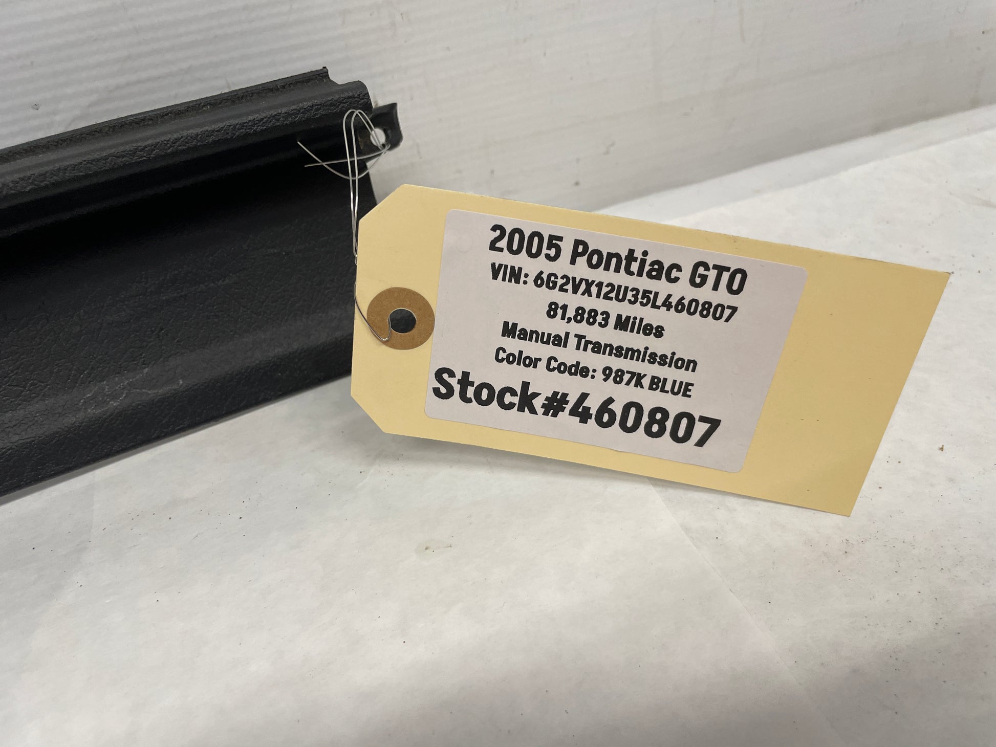 2005 Pontiac GTO LH Driver Front Seat Outer Track Frame Rail Trim Cover OEM - Day's Parts Yard