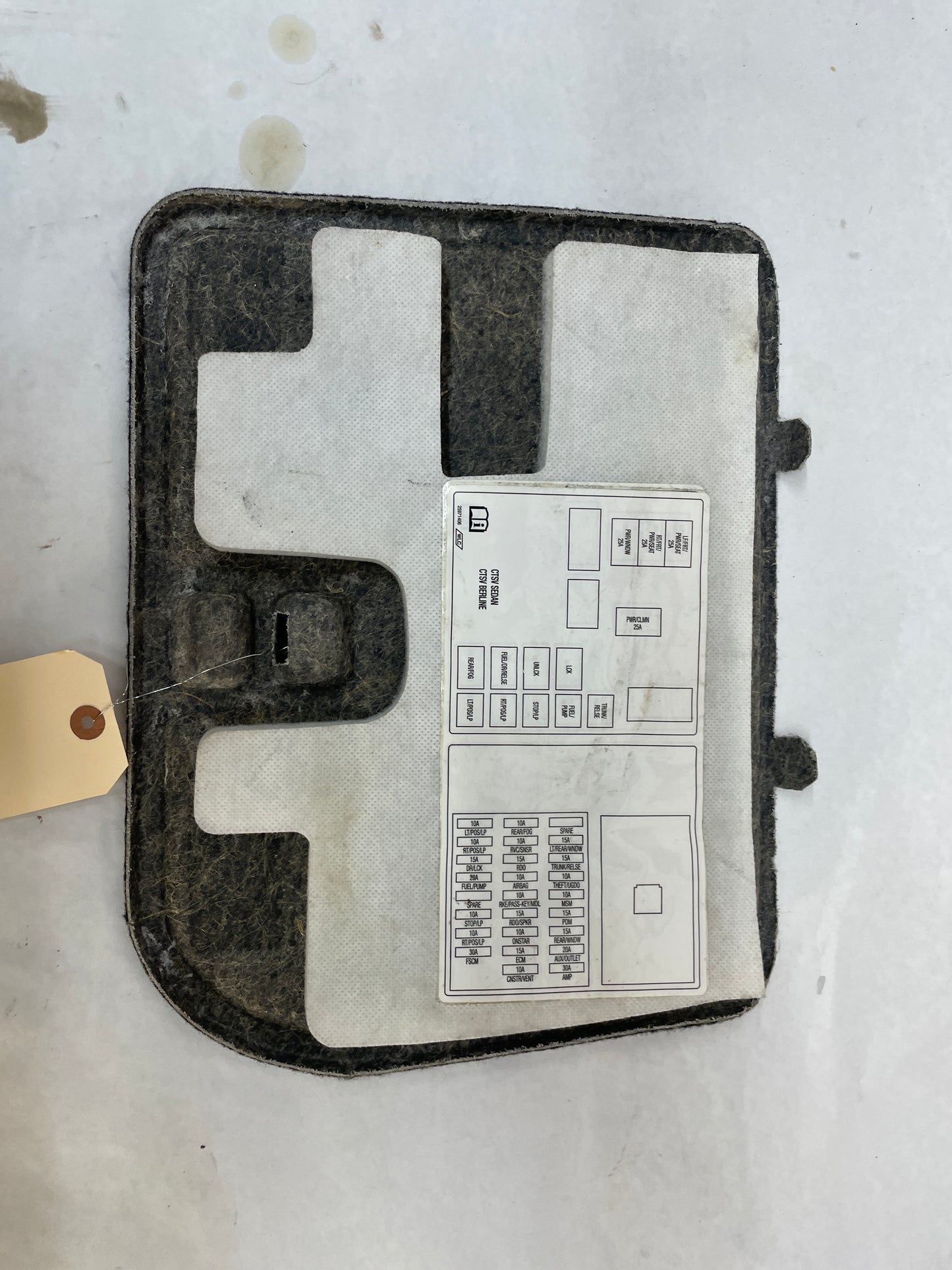 2009 Cadillac CTS-V Sedan Trunk Interior Compartment Fuse Box Block Cover Lid Door OEM - Day's Parts Yard