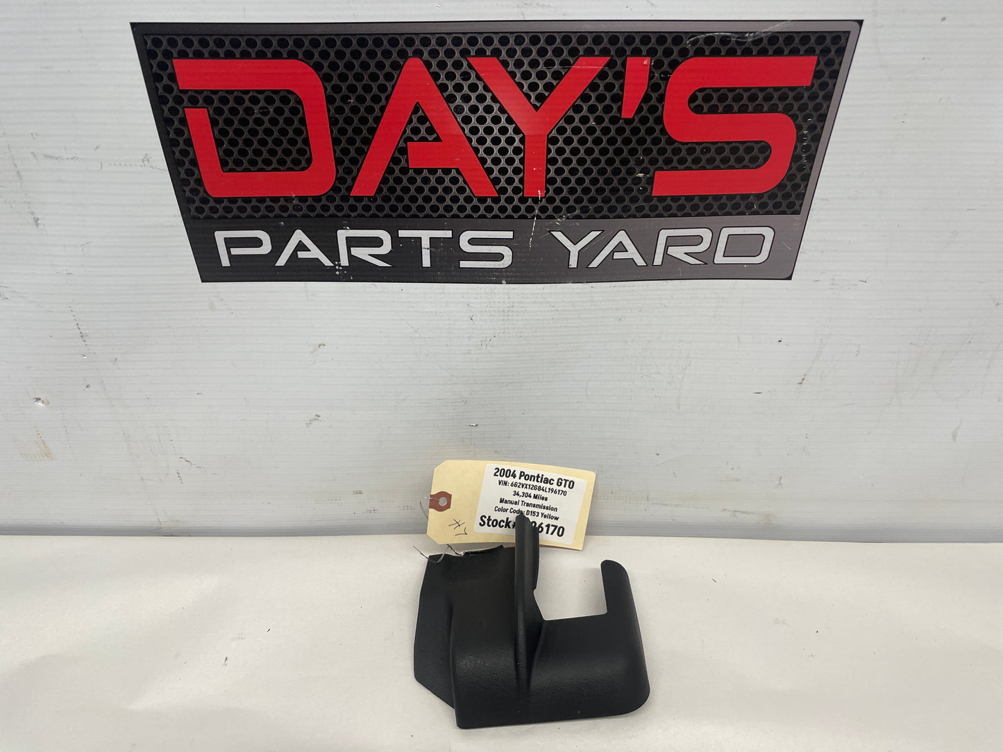 2004 Pontiac GTO  Driver Front Seat Rear Track Rail Bracket Plastic Trim  OEM - Day's Parts Yard