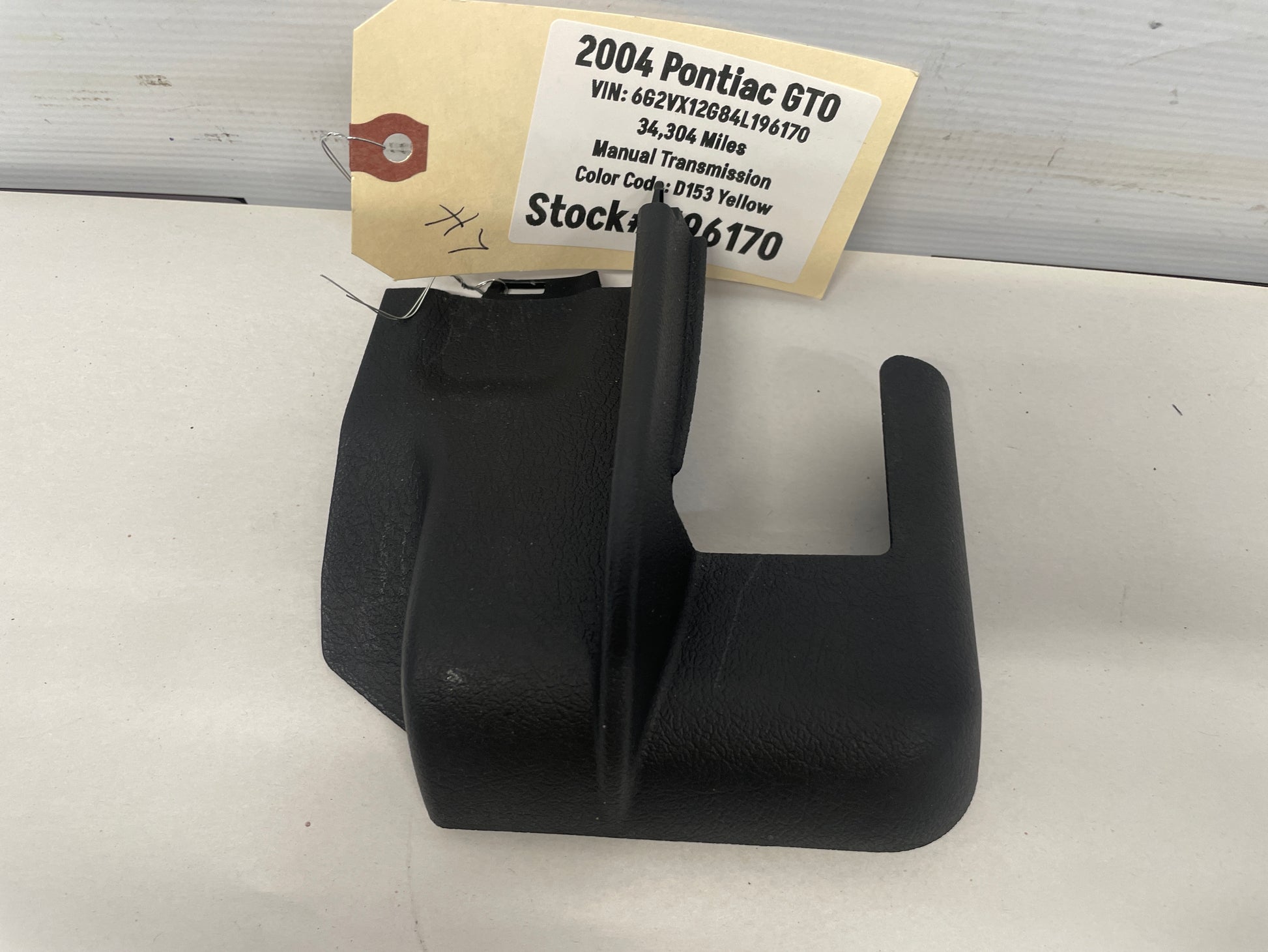 2004 Pontiac GTO  Driver Front Seat Rear Track Rail Bracket Plastic Trim  OEM - Day's Parts Yard