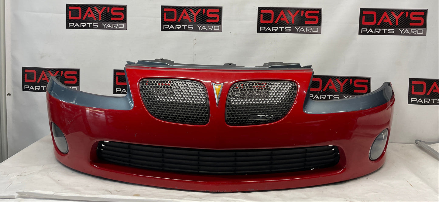 2005 Pontiac GTO Complete Front Bumper Cover Fascia Red OEM