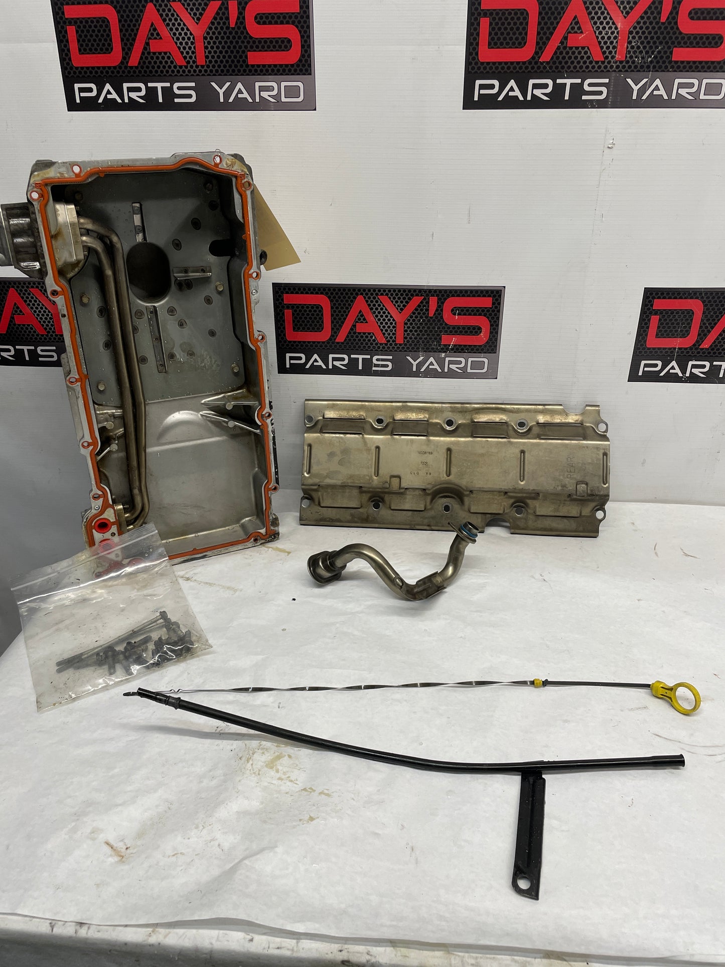 2004 Pontiac GTO Complete Oil Pan Assembly Pick Up Tube Windage Tray Dip Stick OEM - Day's Parts Yard