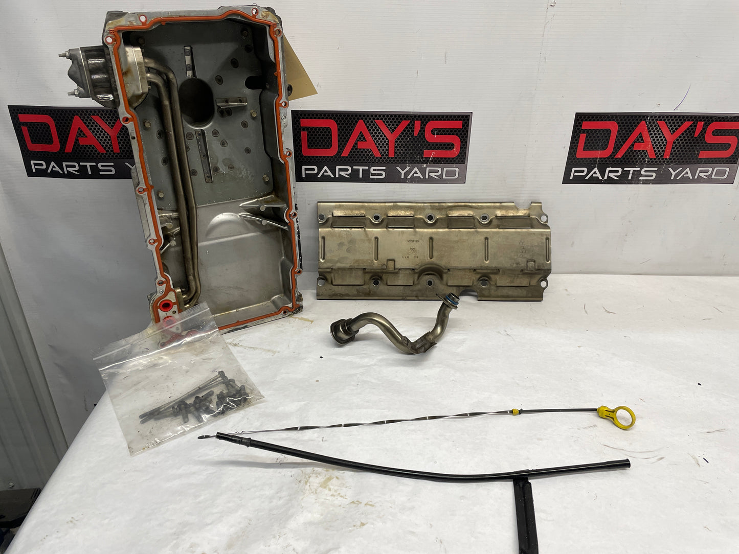 2004 Pontiac GTO Complete Oil Pan Assembly Pick Up Tube Windage Tray Dip Stick OEM - Day's Parts Yard