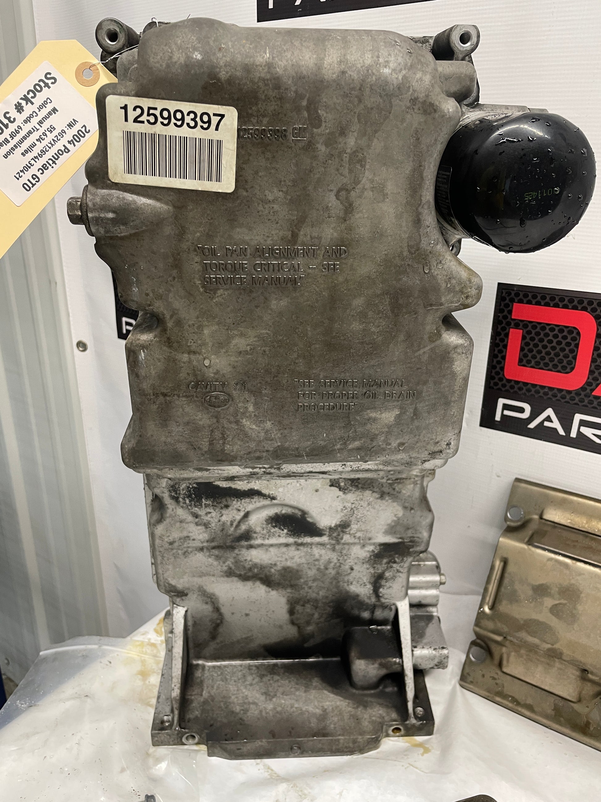 2004 Pontiac GTO Complete Oil Pan Assembly Pick Up Tube Windage Tray Dip Stick OEM - Day's Parts Yard
