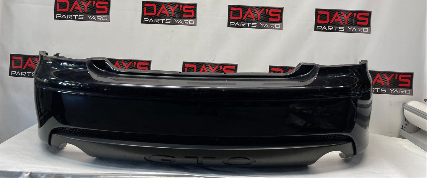 2005 Pontiac GTO Rear Bump Cover w/ Insert Valance Panel Black OEM - Day's Parts Yard