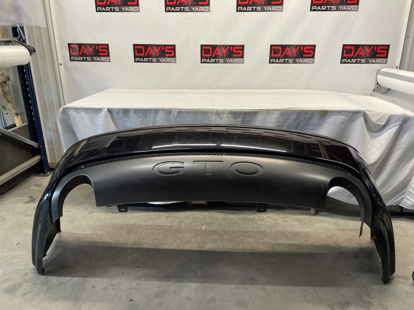 2005 Pontiac GTO Rear Bump Cover w/ Insert Valance Panel Black OEM - Day's Parts Yard