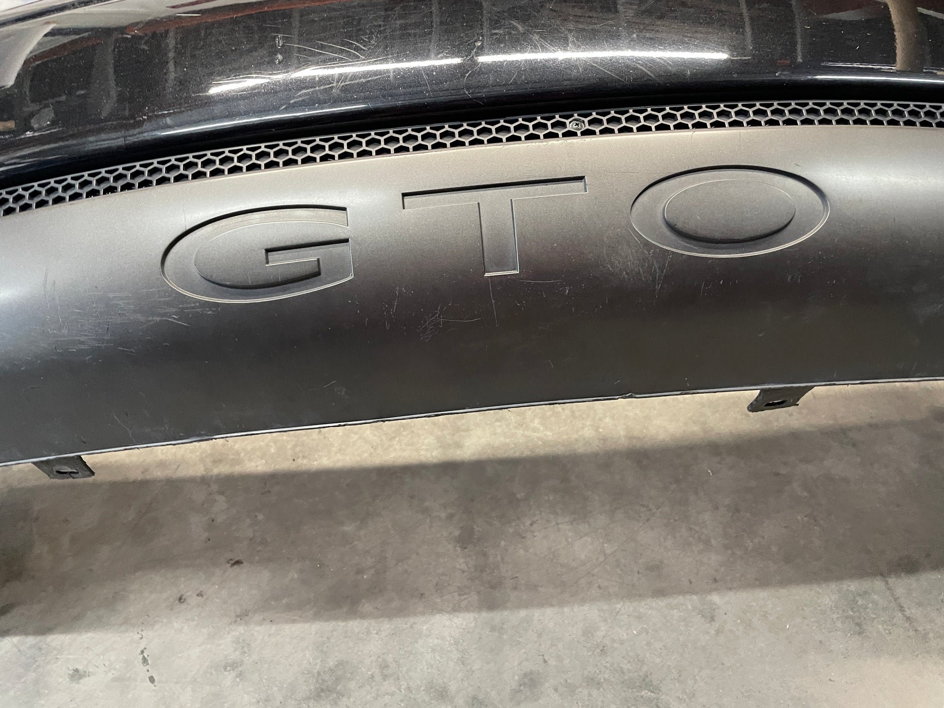 2005 Pontiac GTO Rear Bump Cover w/ Insert Valance Panel Black OEM - Day's Parts Yard