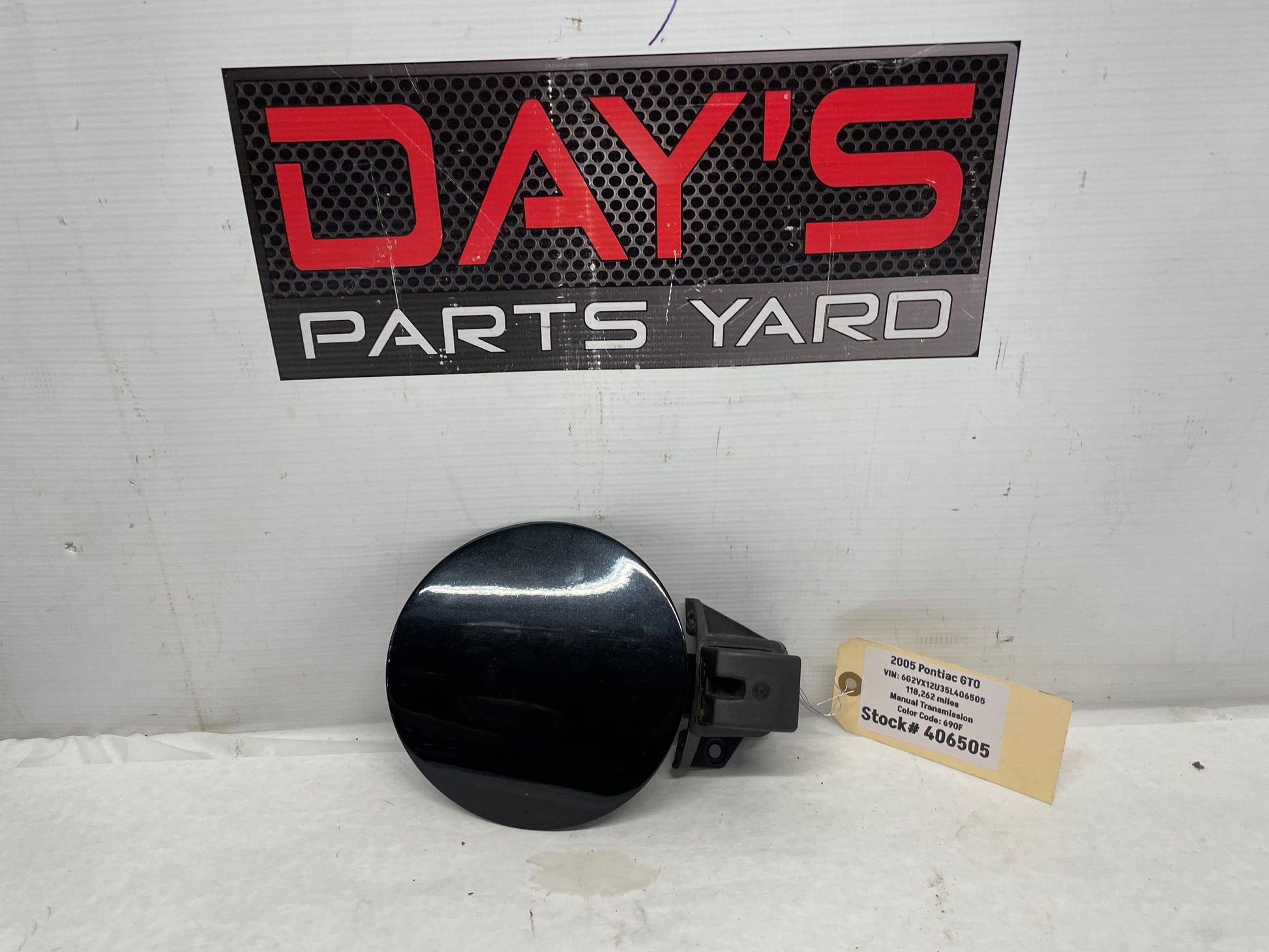 2005 Pontiac GTO Fuel Gas Door Lid Cover Assembly OEM - Day's Parts Yard