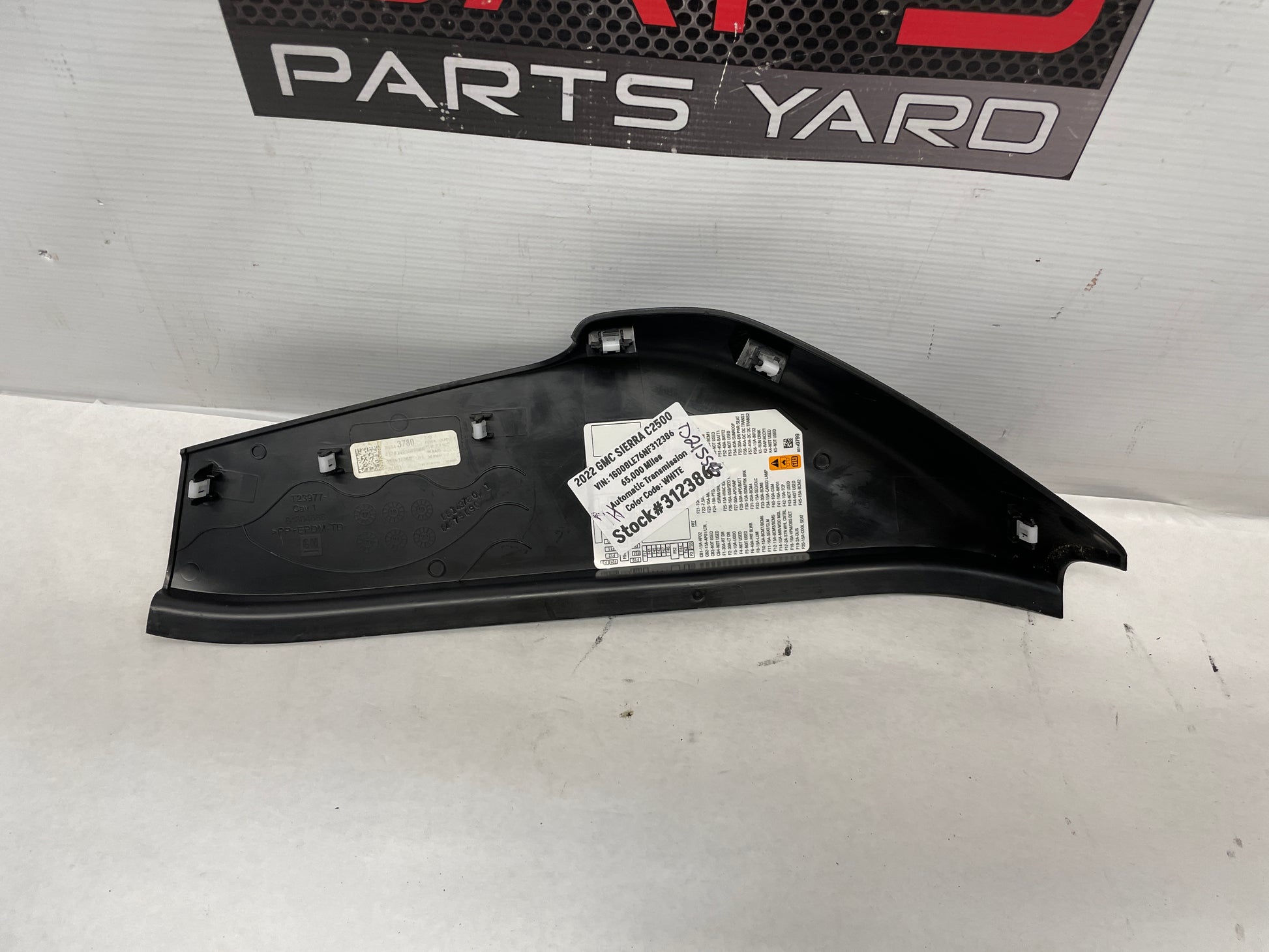 2022 GMC Sierra C2500 RH Passenger Dashboard Fuse Cover Trim OEM - Day's Parts Yard