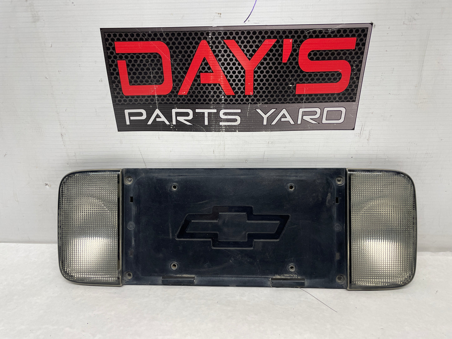 2001 Chevy C5 Corvette Rear License Plate Bracket Finish Panel Reverse Lights OEM - Day's Parts Yard