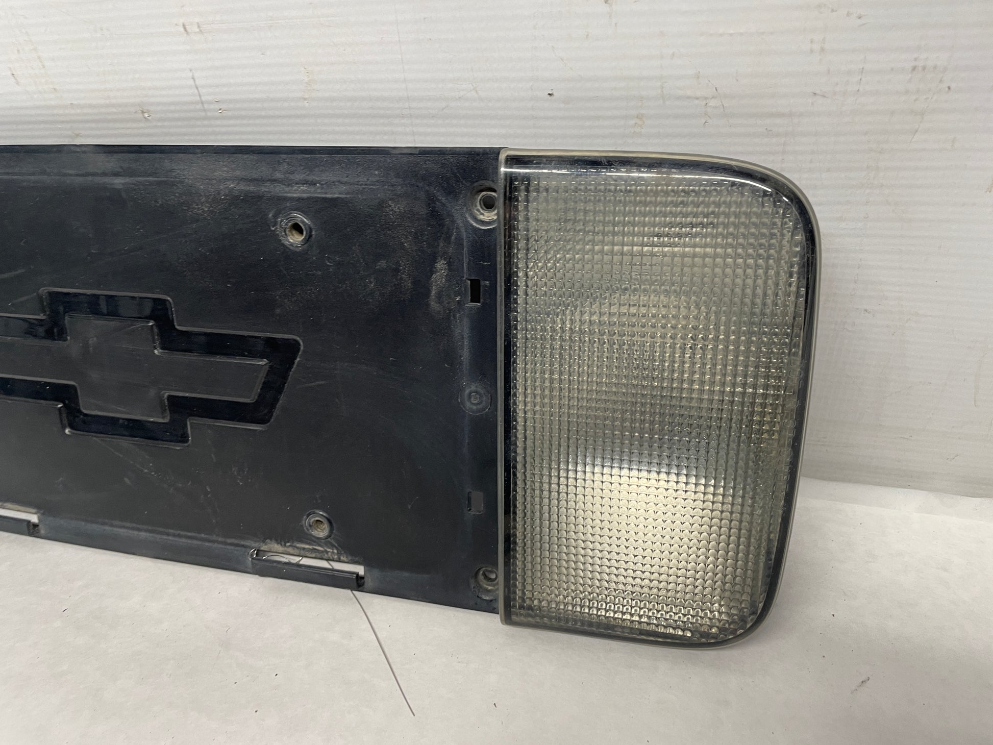 2001 Chevy C5 Corvette Rear License Plate Bracket Finish Panel Reverse Lights OEM - Day's Parts Yard