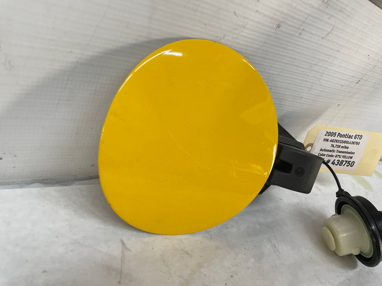 2005 Pontiac GTO Fuel Gas Door Lid Cover Assembly w/ Cap Yellow OEM
