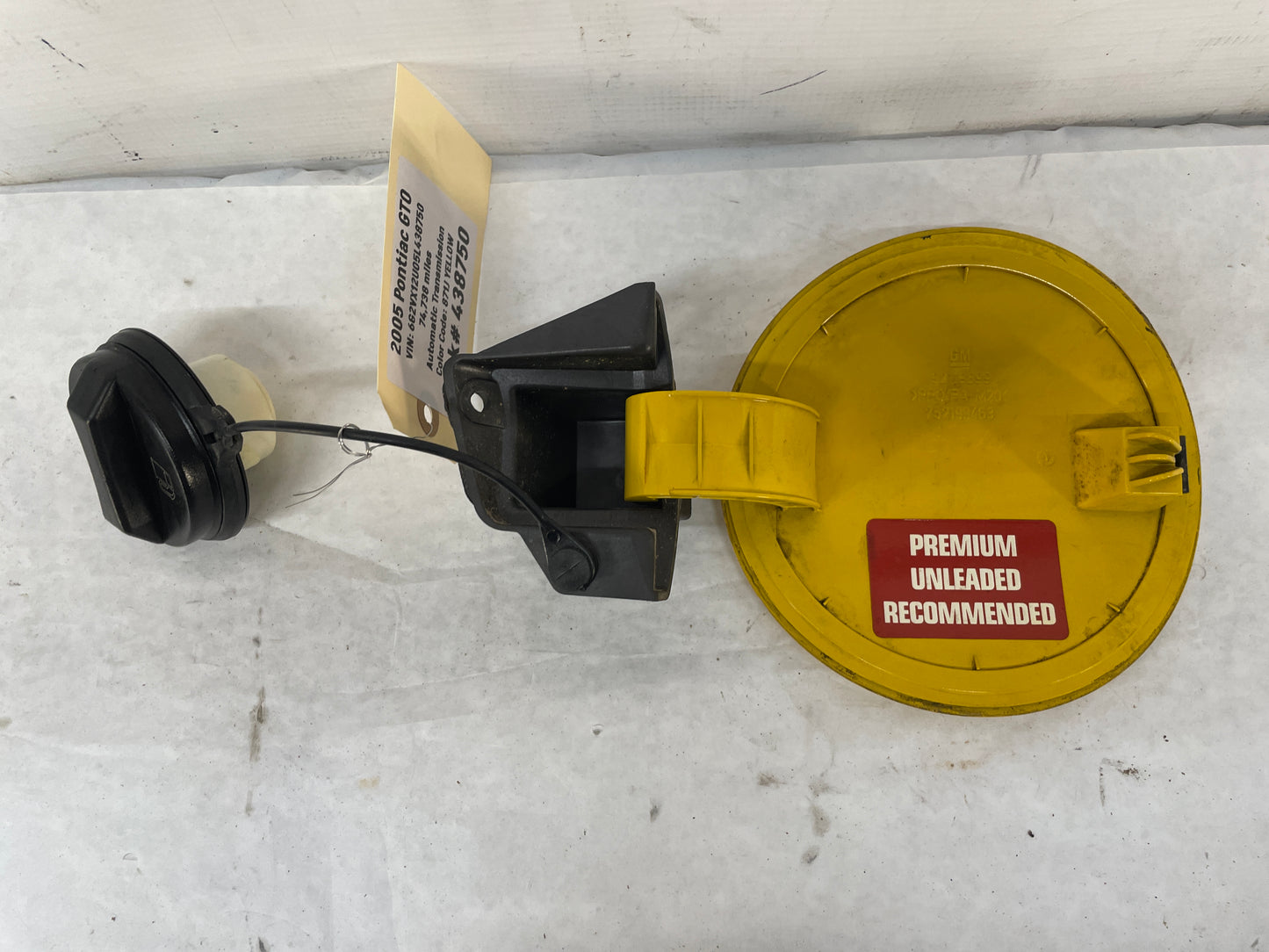 2005 Pontiac GTO Fuel Gas Door Lid Cover Assembly w/ Cap Yellow OEM