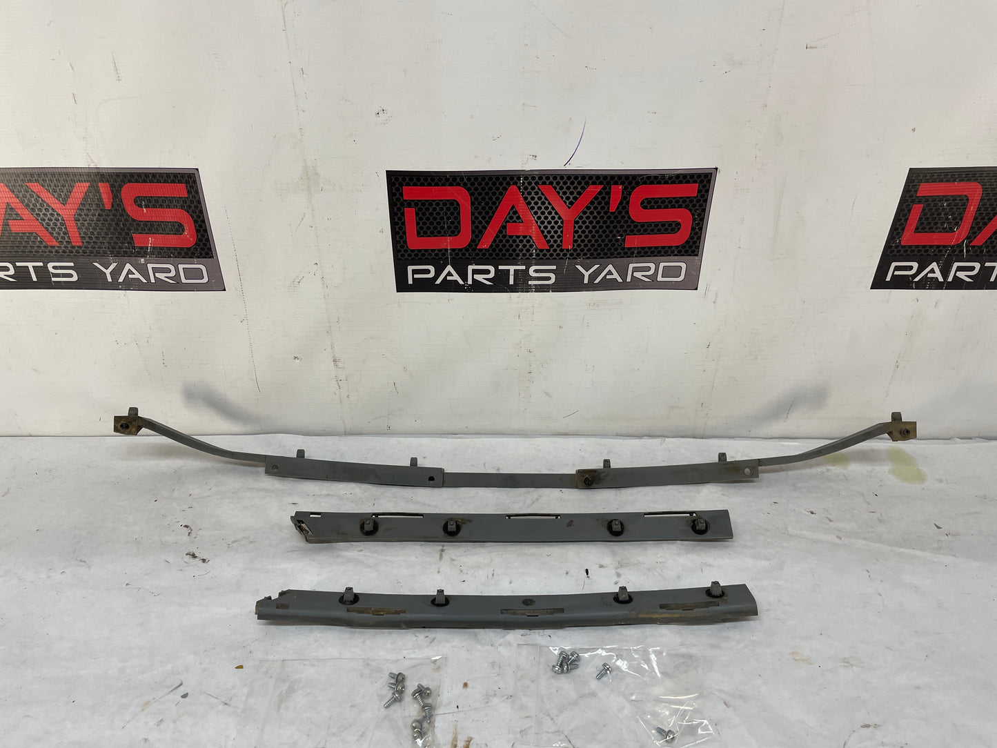 2005 Pontiac GTO RH & LH Rear Bumper Brackets Guides Supports OEM