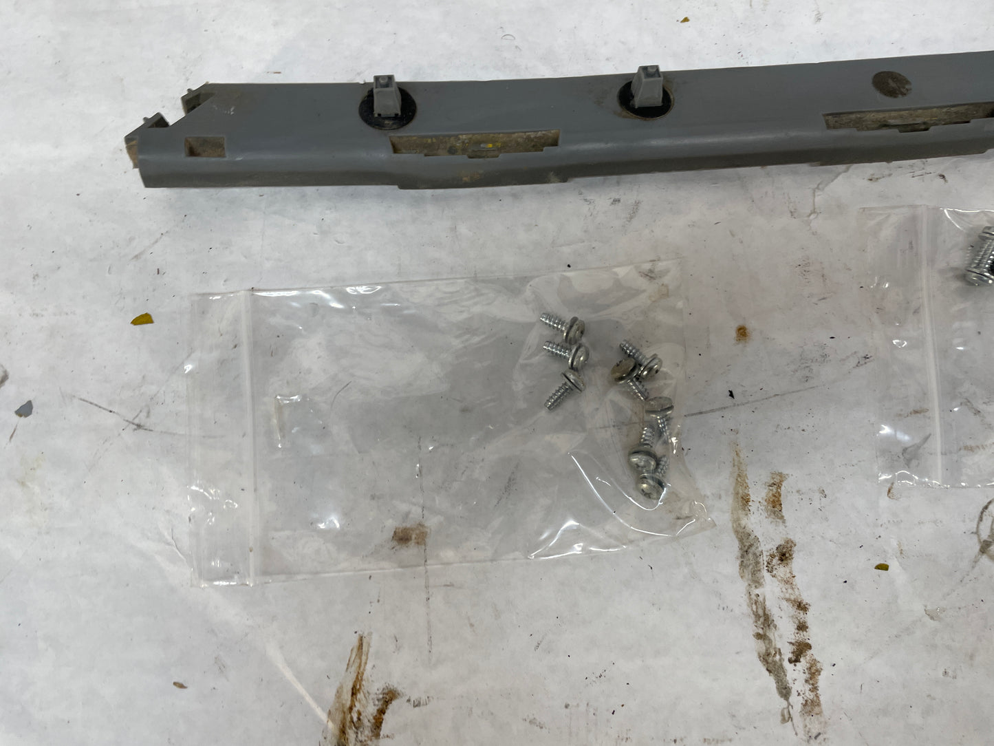 2005 Pontiac GTO RH & LH Rear Bumper Brackets Guides Supports OEM