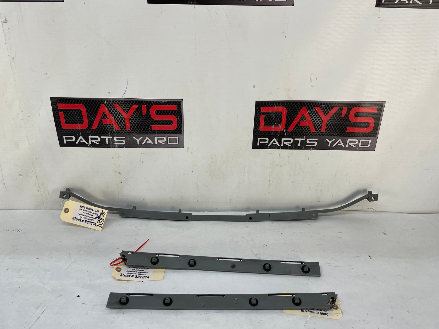 2005 Pontiac GTO RH & LH Rear Bumper Brackets Guides Supports OEM - Day's Parts Yard