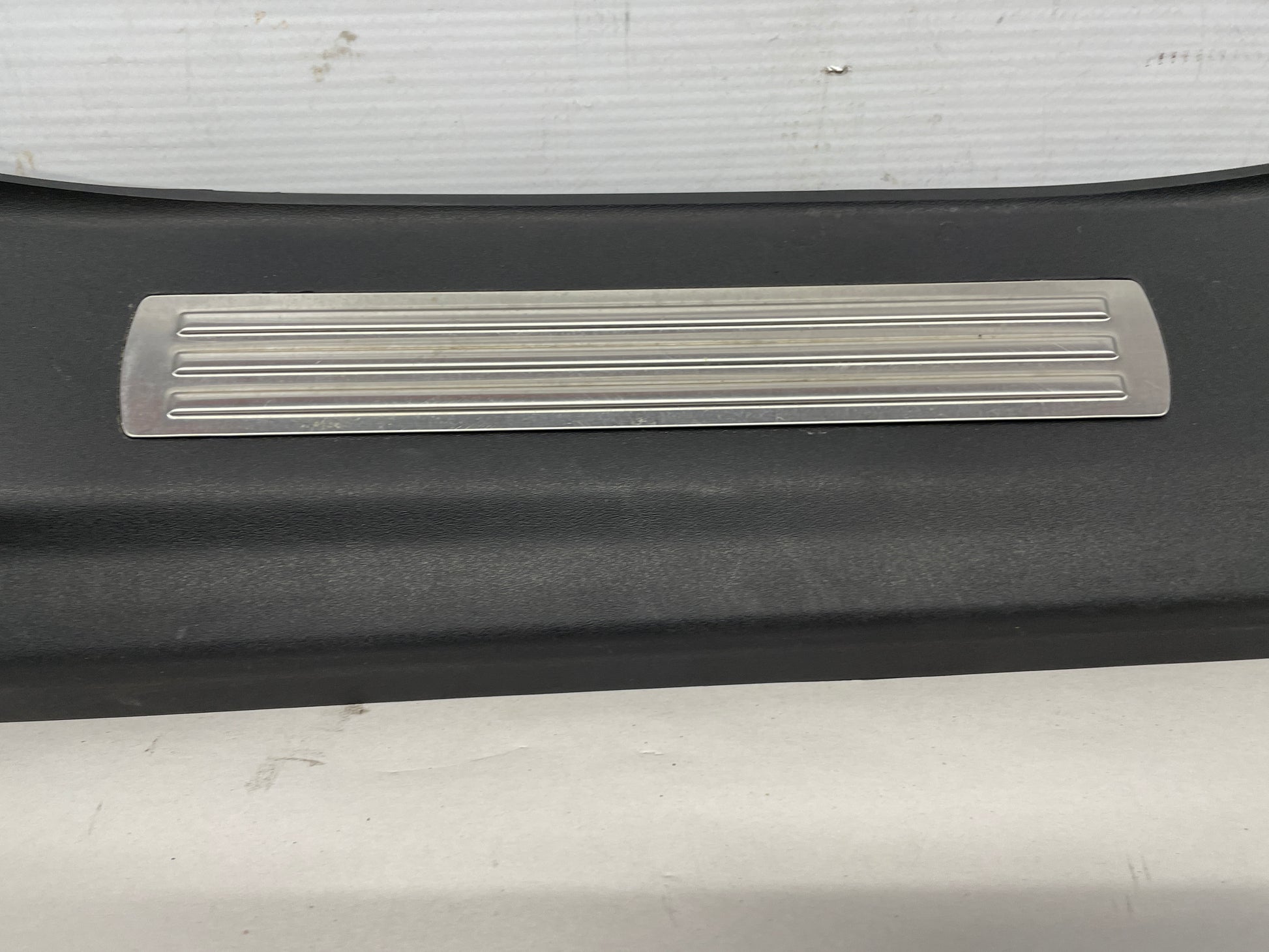 2015 Chevy SS Sedan LH Driver Rear Sill Scuff Plate Panel OEM - Day's Parts Yard