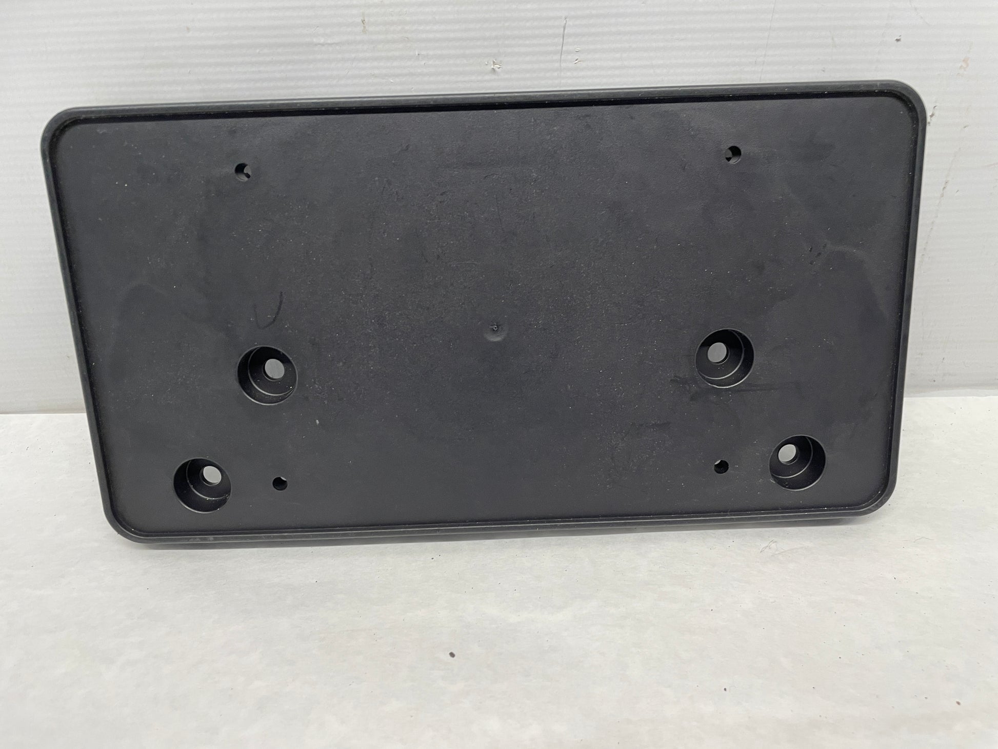 2014 Chevy SS Sedan Front Bumper License Plate Bracket Mount OEM - Day's Parts Yard
