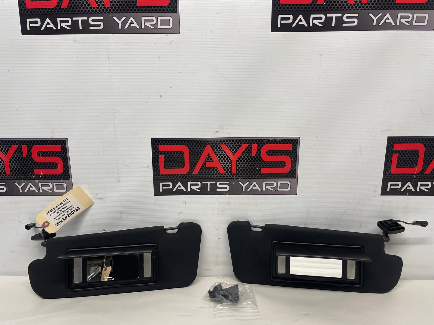 2004 Pontiac GTO RH & LH Sun Visors Sunvisors w/ Clips OEM - Day's Parts Yard