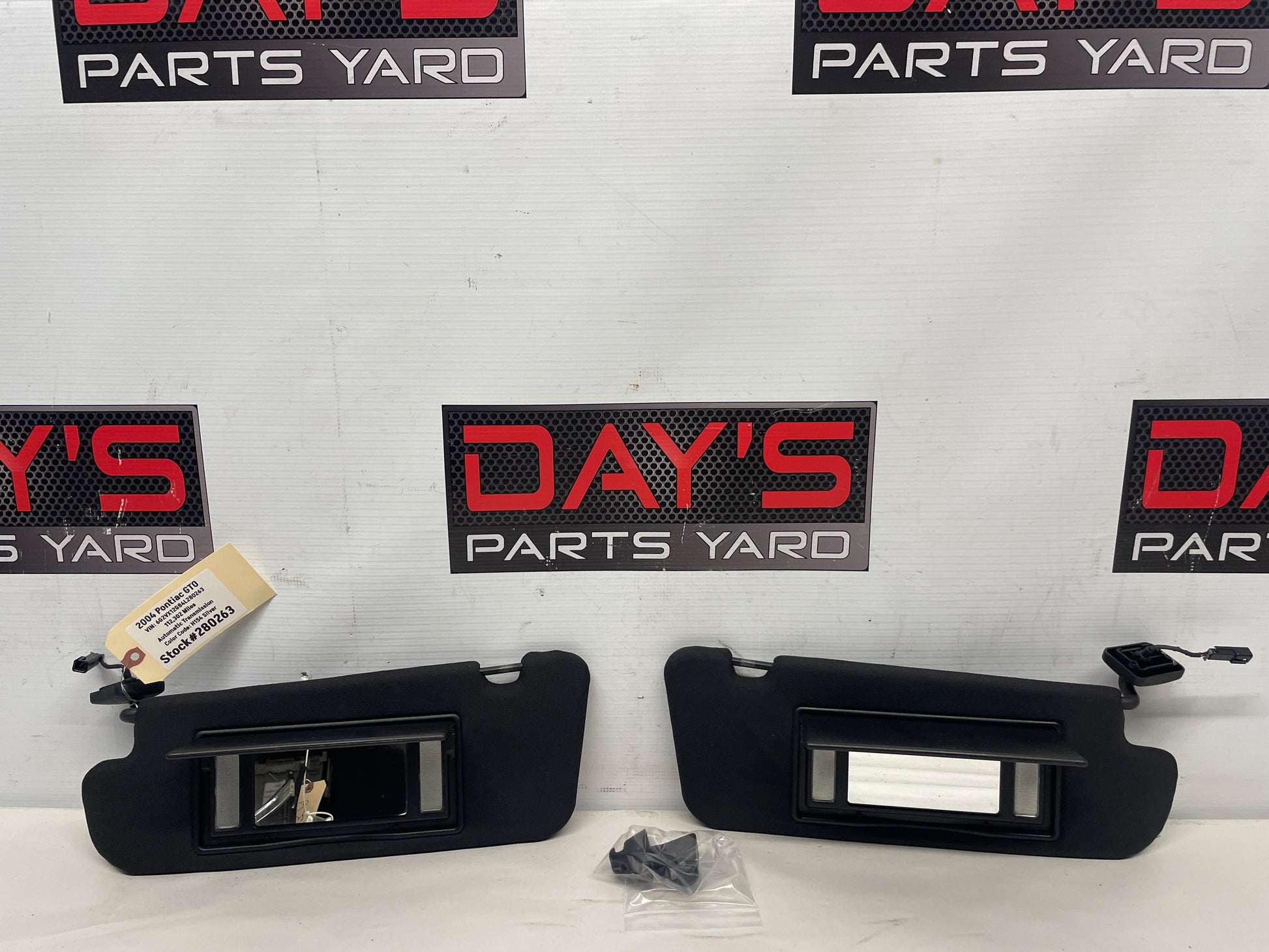 2004 Pontiac GTO RH & LH Sun Visors Sunvisors w/ Clips OEM - Day's Parts Yard