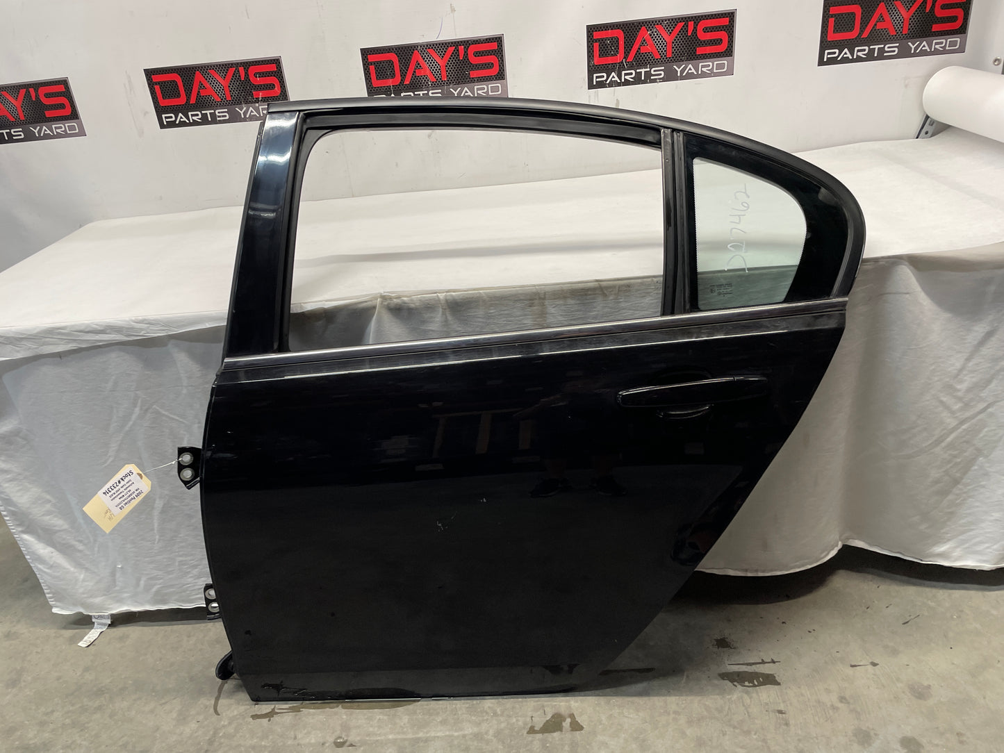 2009 Pontiac G8 LH Driver Rear Exterior Door Black OEM - Day's Parts Yard