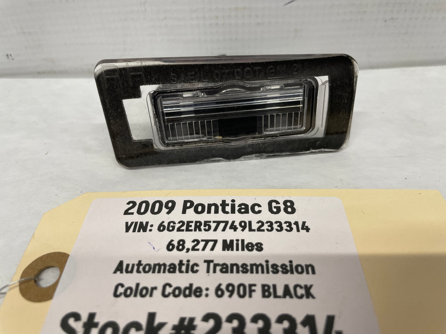 2009 Pontiac G8 LH Driver License Plate Tag Light OEM - Day's Parts Yard