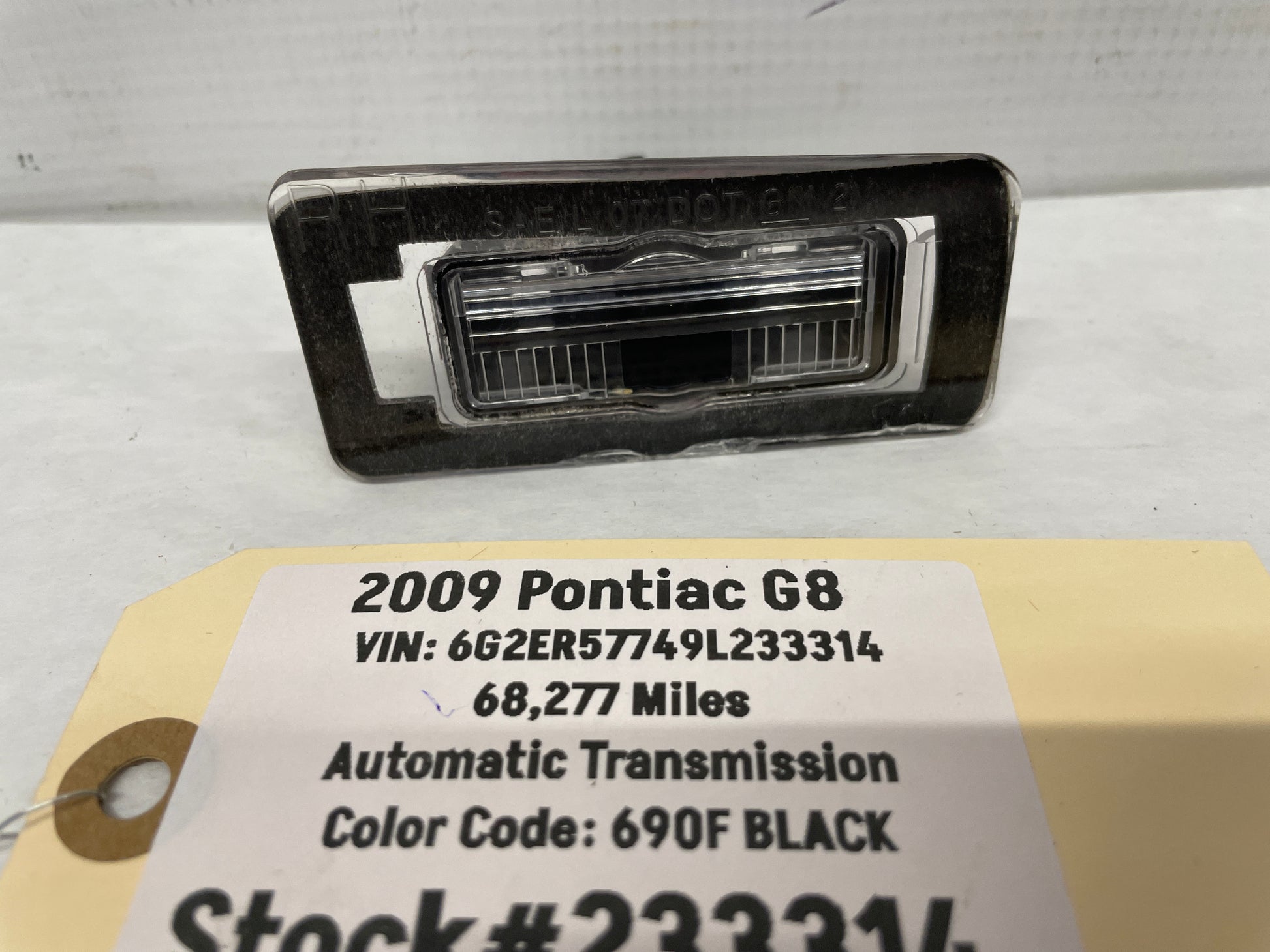 2009 Pontiac G8 LH Driver License Plate Tag Light OEM - Day's Parts Yard