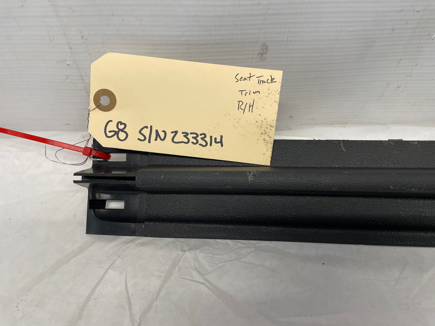 2009 Pontiac G8 RH Passenger Front Outer Seat Track Trim Covers OEM - Day's Parts Yard