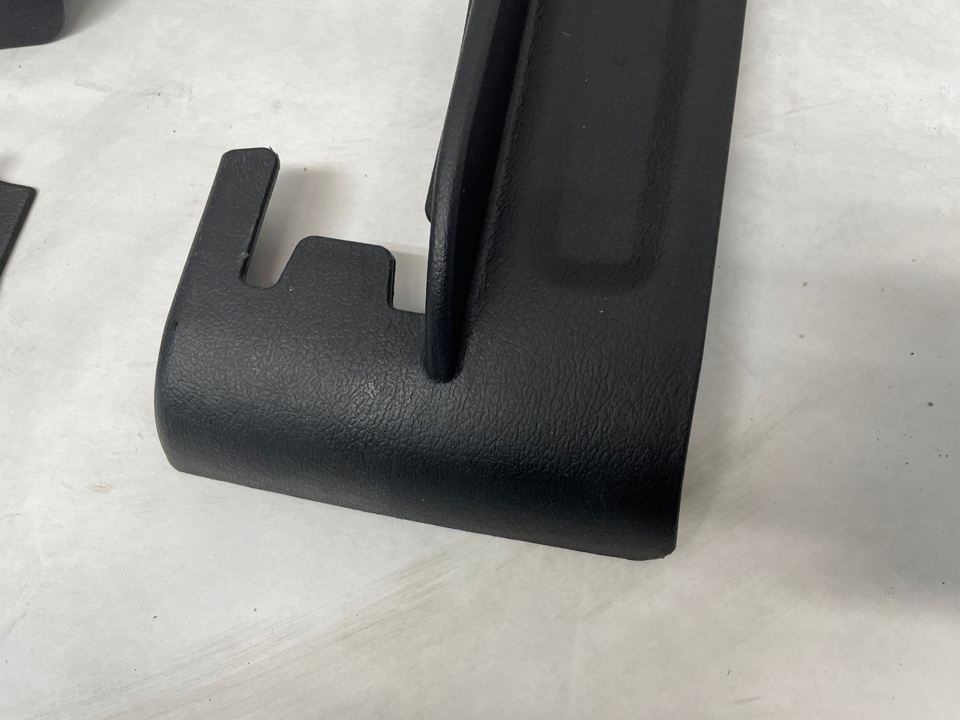 2005 Pontiac GTO LH Driver 4pc Seat Rail Frame Plastic Trim Set OEM - Day's Parts Yard
