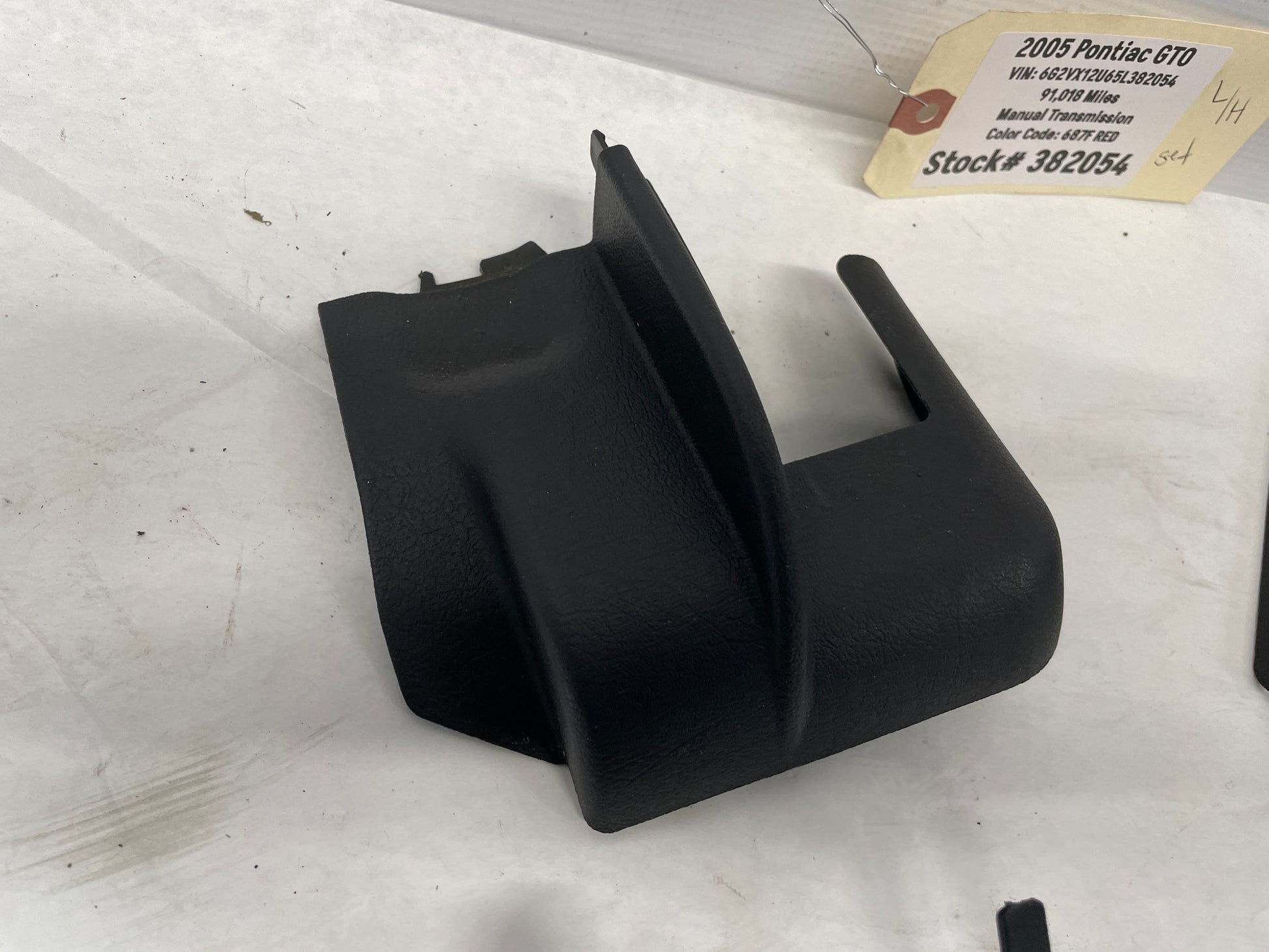 2005 Pontiac GTO LH Driver 4pc Seat Rail Frame Plastic Trim Set OEM - Day's Parts Yard