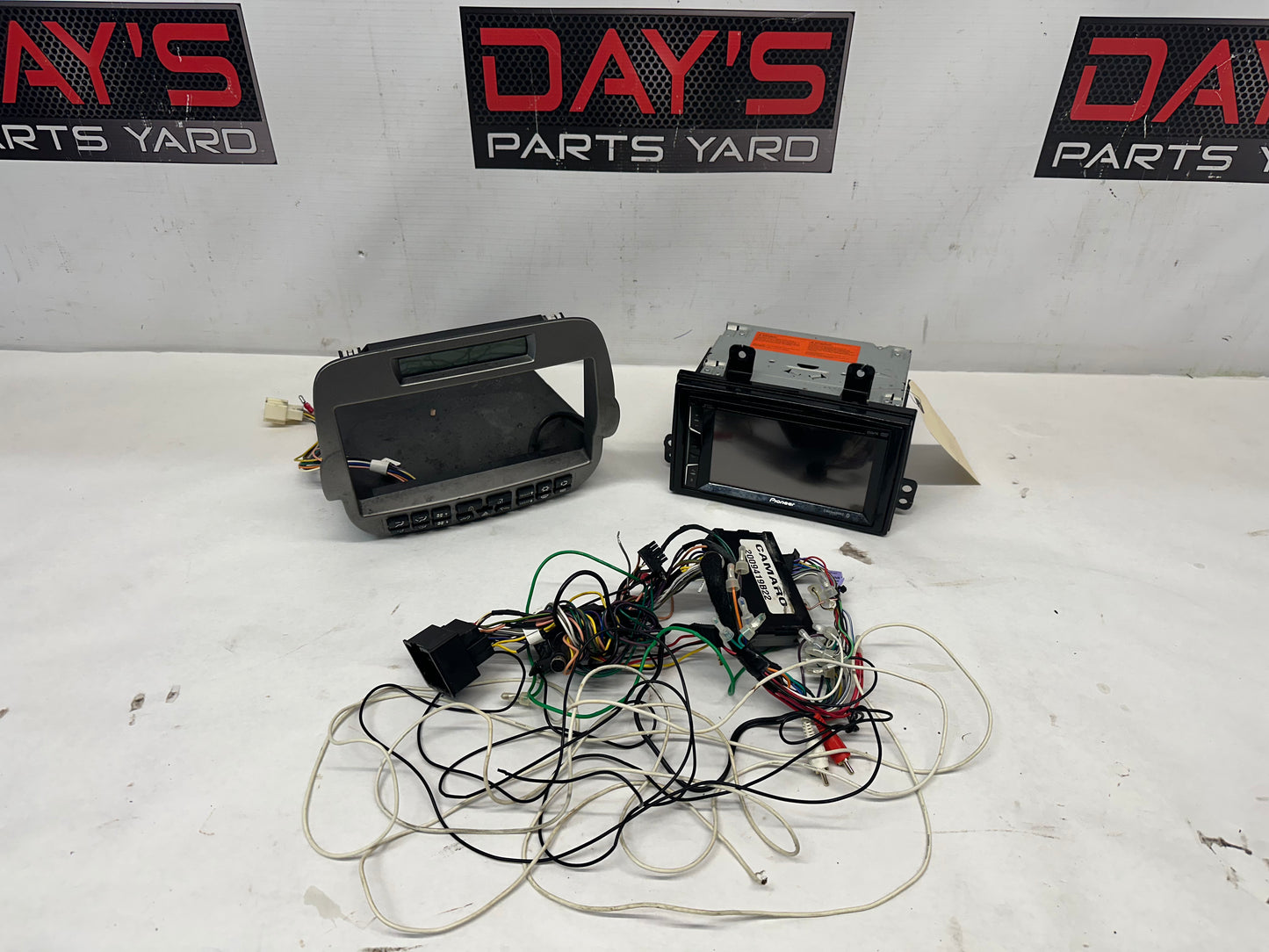 2010 Chevy Camaro SS Aftermarket Pioneer Radio/ DVD  w/ Bezel Control Panel Mount - Day's Parts Yard