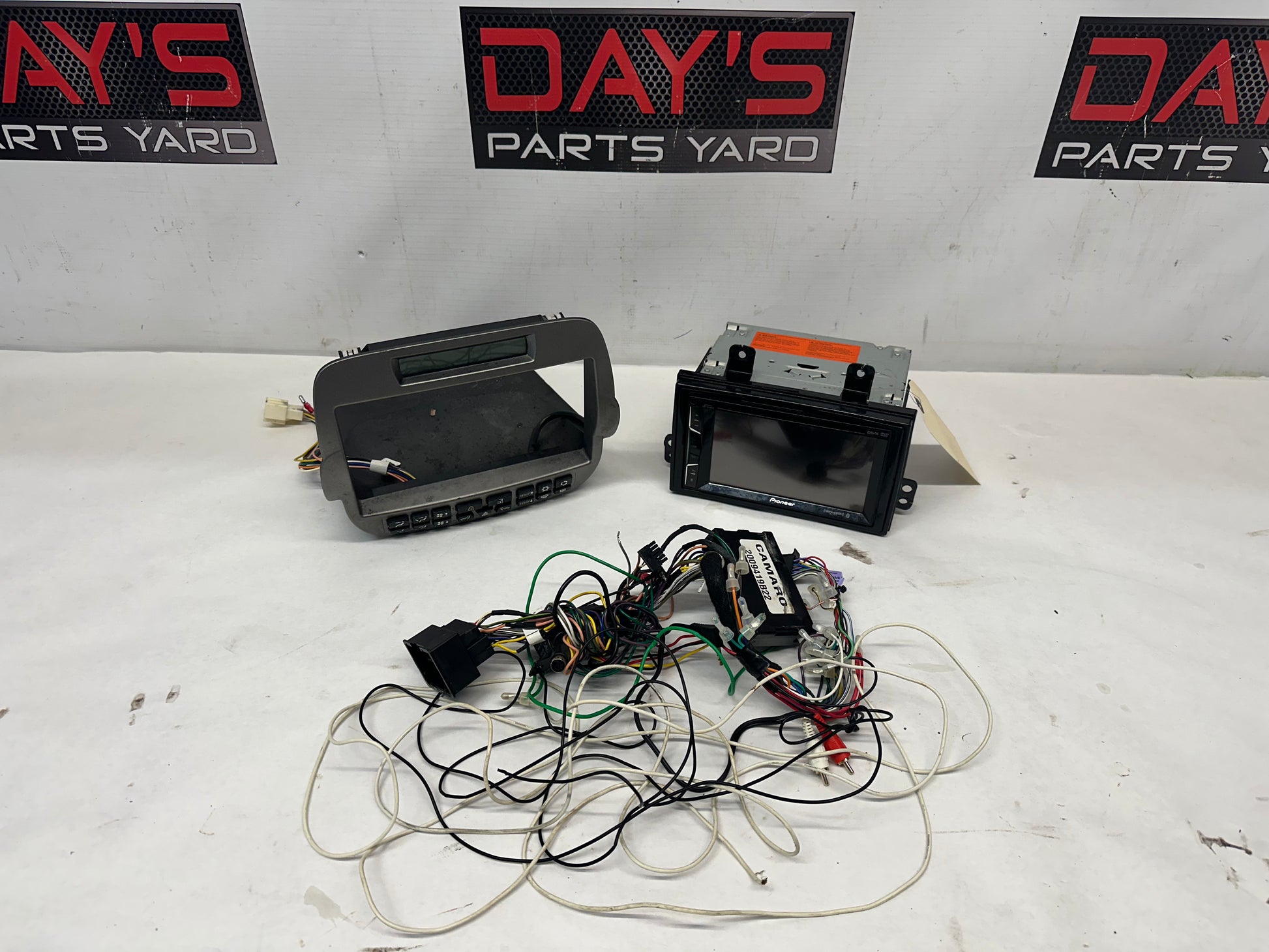 2010 Chevy Camaro SS Aftermarket Pioneer Radio/ DVD  w/ Bezel Control Panel Mount - Day's Parts Yard