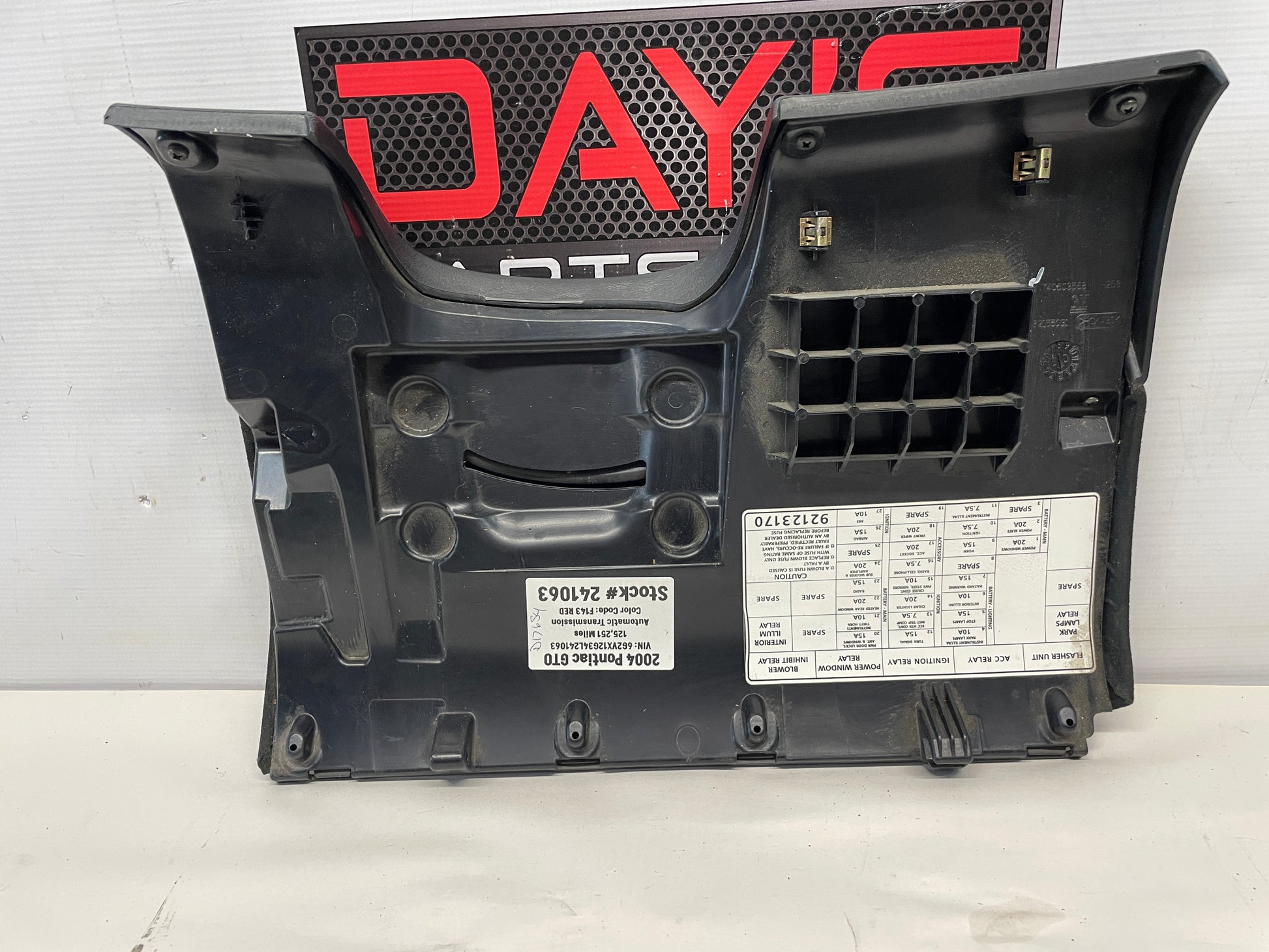 2004 Pontiac GTO Black Suede Knee Bolster Fuse Cover OEM - Day's Parts Yard