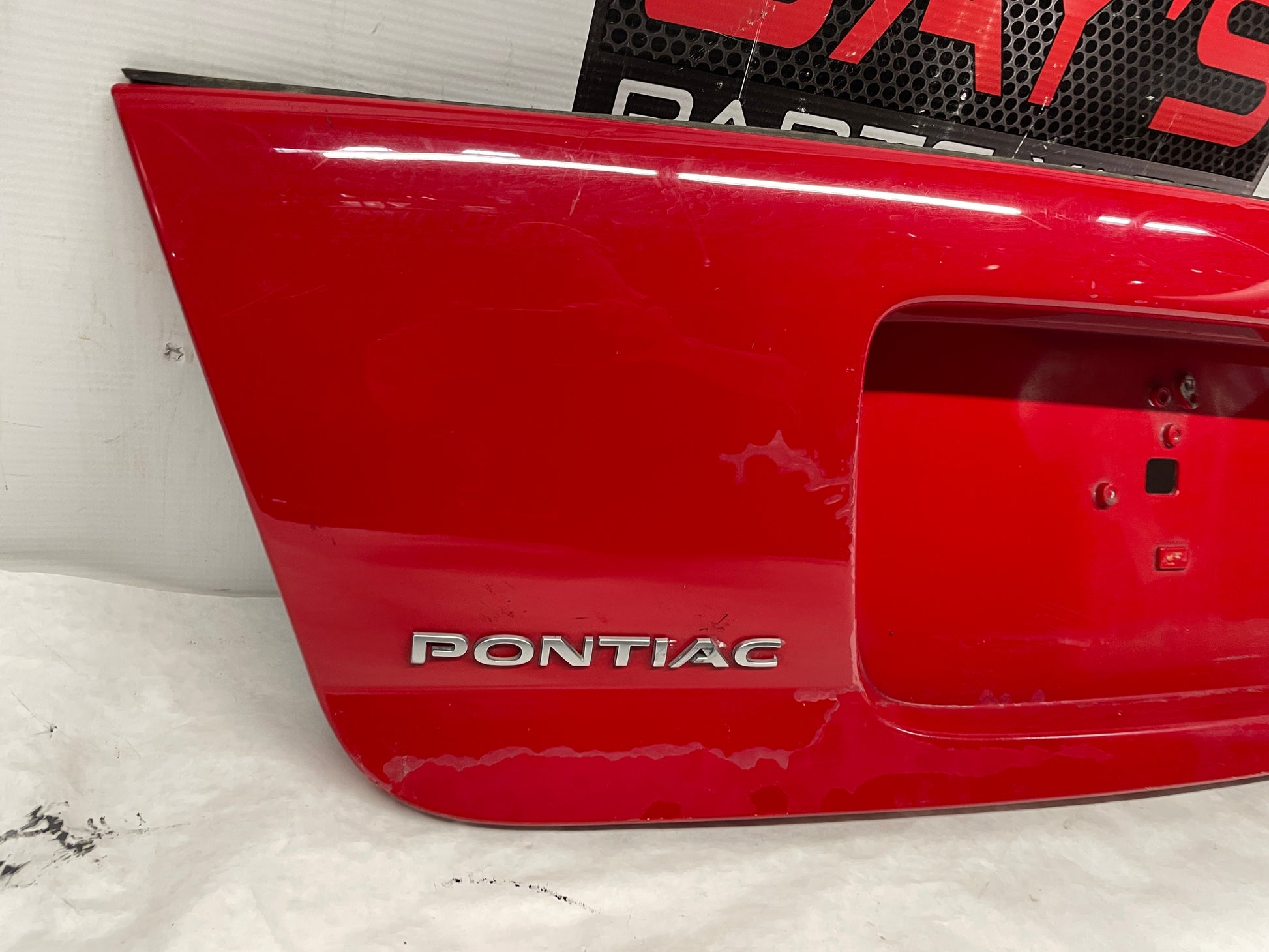 2006 Pontiac GTO Trunk Deck Lid Filler Insert Applique Panel Red OEM - Day's Parts Yard