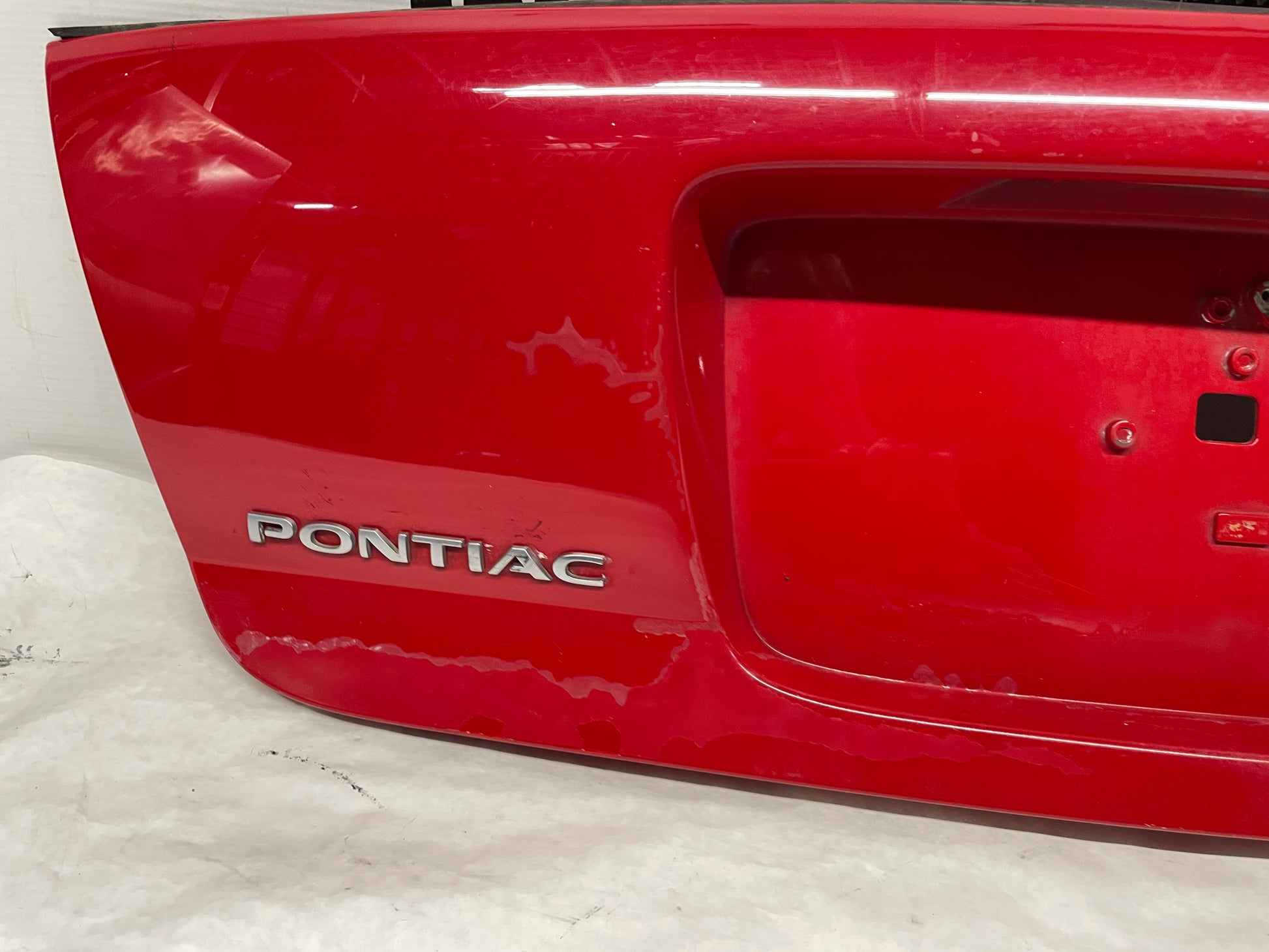 2006 Pontiac GTO Trunk Deck Lid Filler Insert Applique Panel Red OEM - Day's Parts Yard