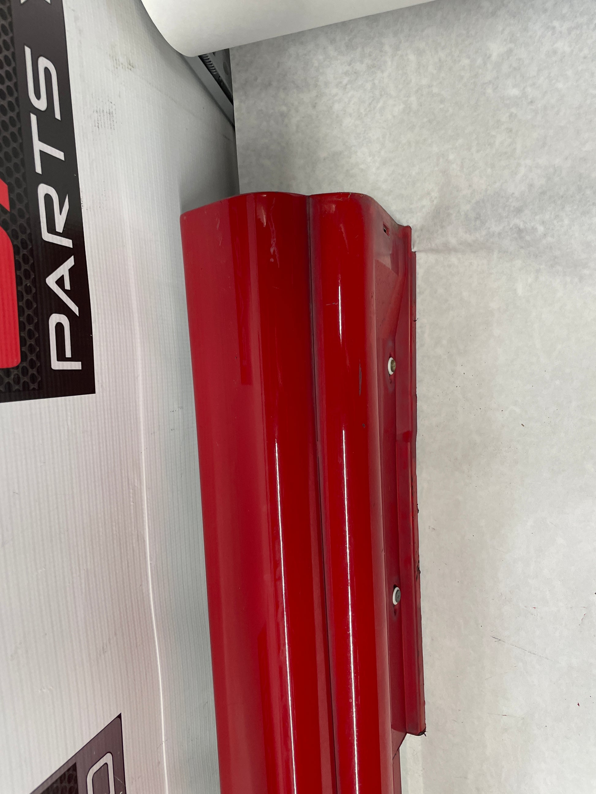 2006 Pontiac GTO LH Driver Rocker Molding Side Skirt Trim Panel Red OEM - Day's Parts Yard