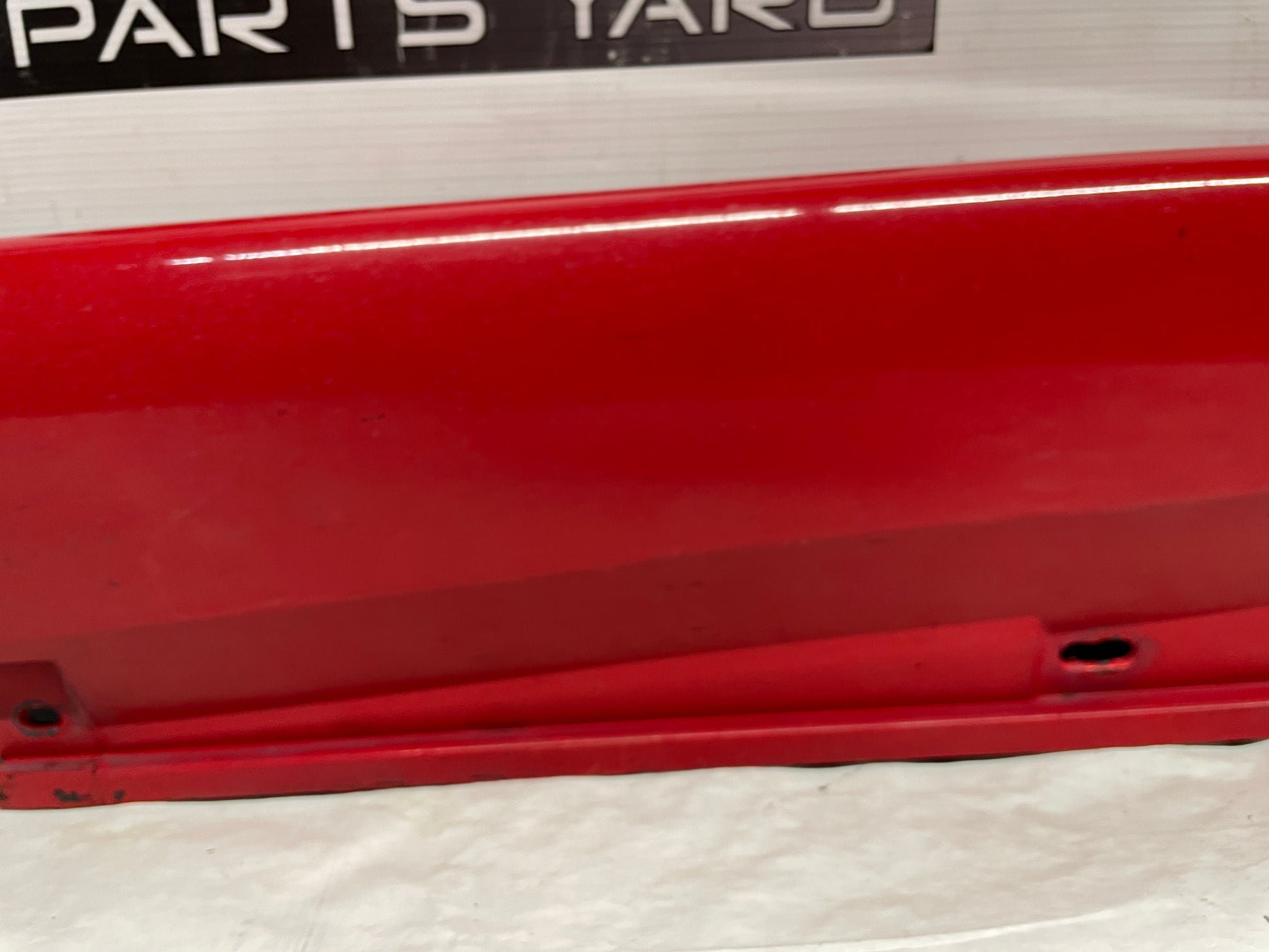 2006 Pontiac GTO LH Driver Rocker Molding Side Skirt Trim Panel Red OEM - Day's Parts Yard