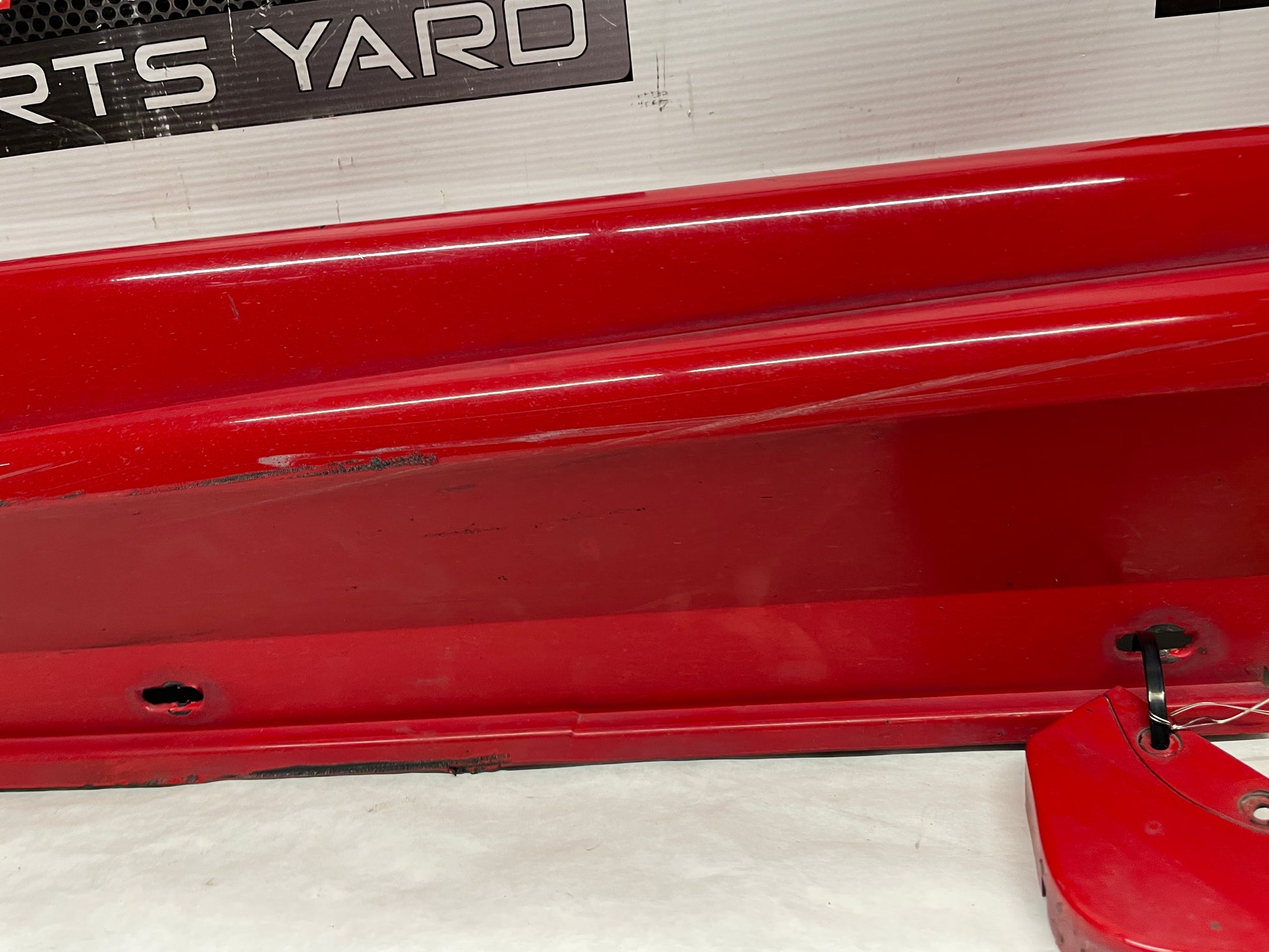 2006 Pontiac GTO LH Driver Rocker Molding Side Skirt Trim Panel Red OEM - Day's Parts Yard