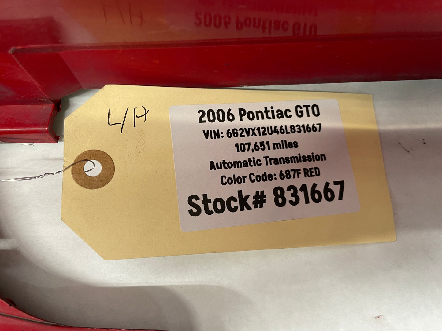 2006 Pontiac GTO LH Driver Rocker Molding Side Skirt Trim Panel Red OEM - Day's Parts Yard