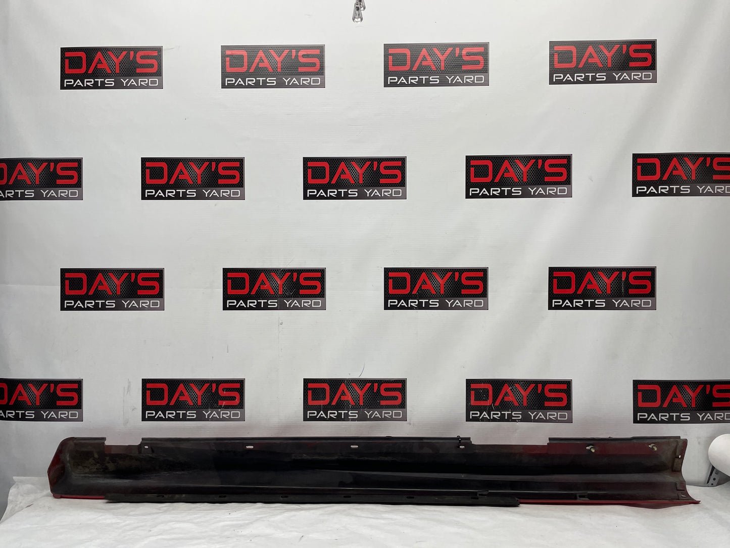 2006 Pontiac GTO LH Driver Rocker Molding Side Skirt Trim Panel Red OEM - Day's Parts Yard