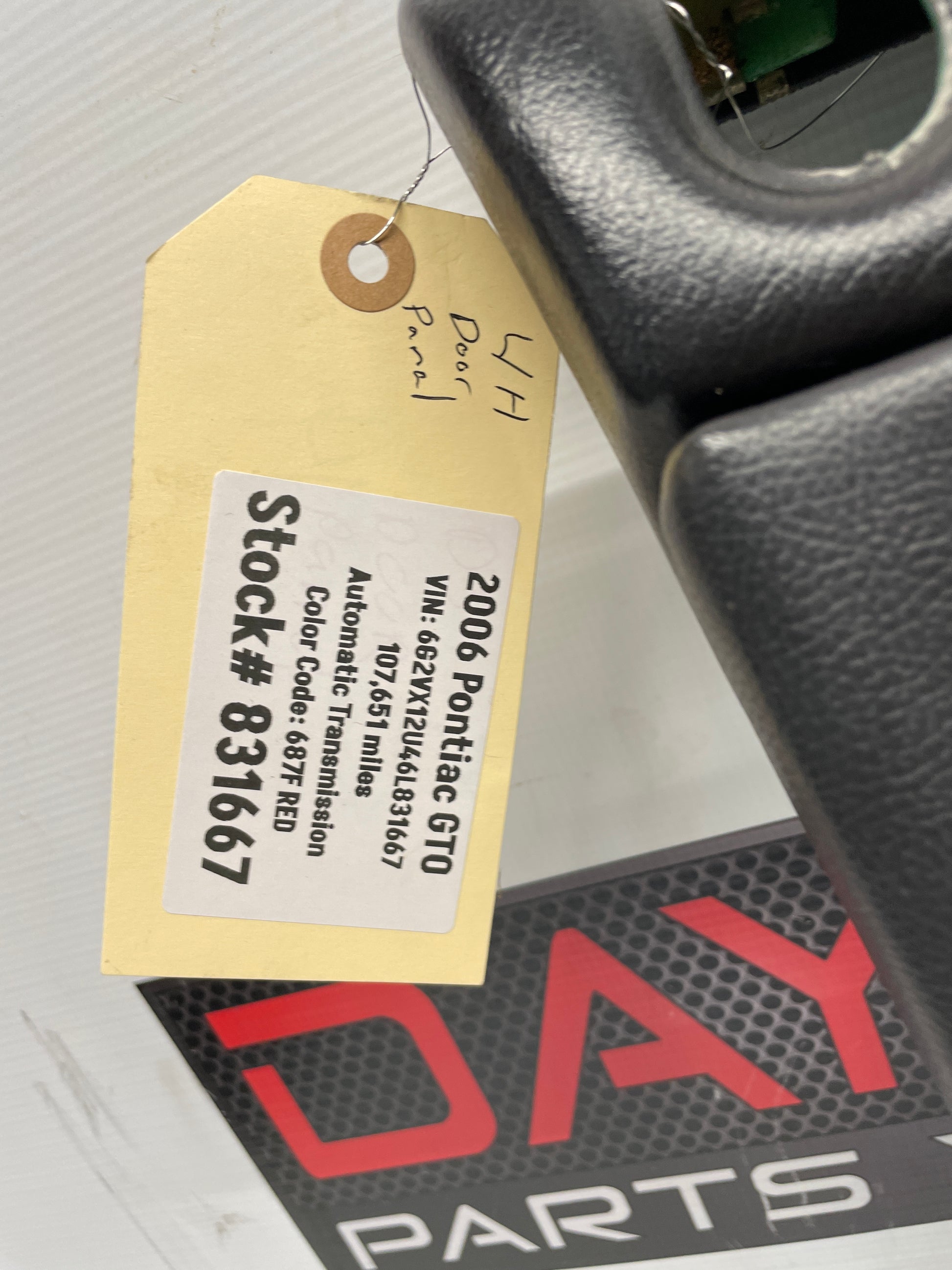 2006 Pontiac GTO LH Driver Front Interior Door Panel Trim OEM - Day's Parts Yard