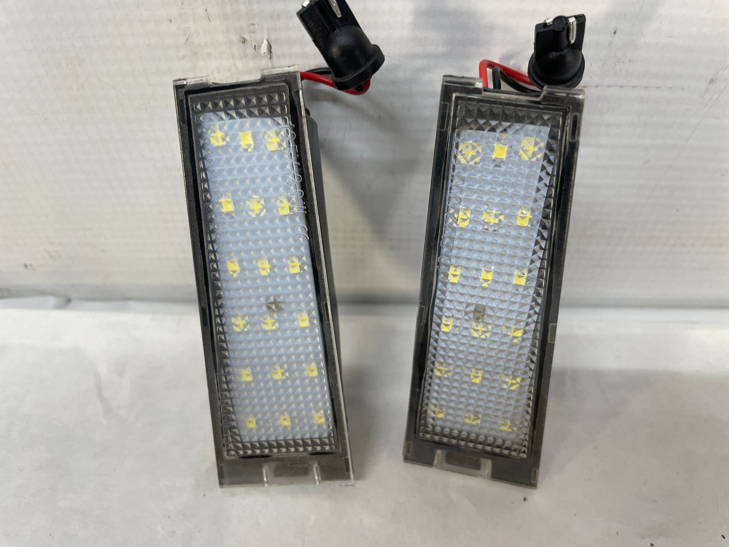2009 Cadillac CTS-V Sedan RH & LH Aftermarket License Plate Tag Light - Day's Parts Yard