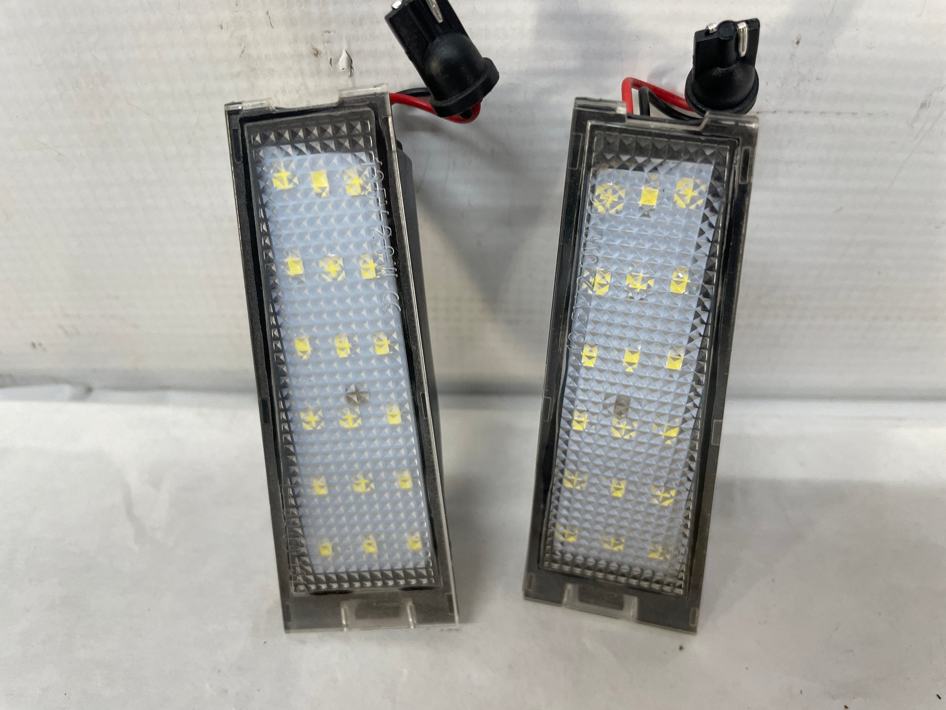 2009 Cadillac CTS-V Sedan RH & LH Aftermarket License Plate Tag Light - Day's Parts Yard